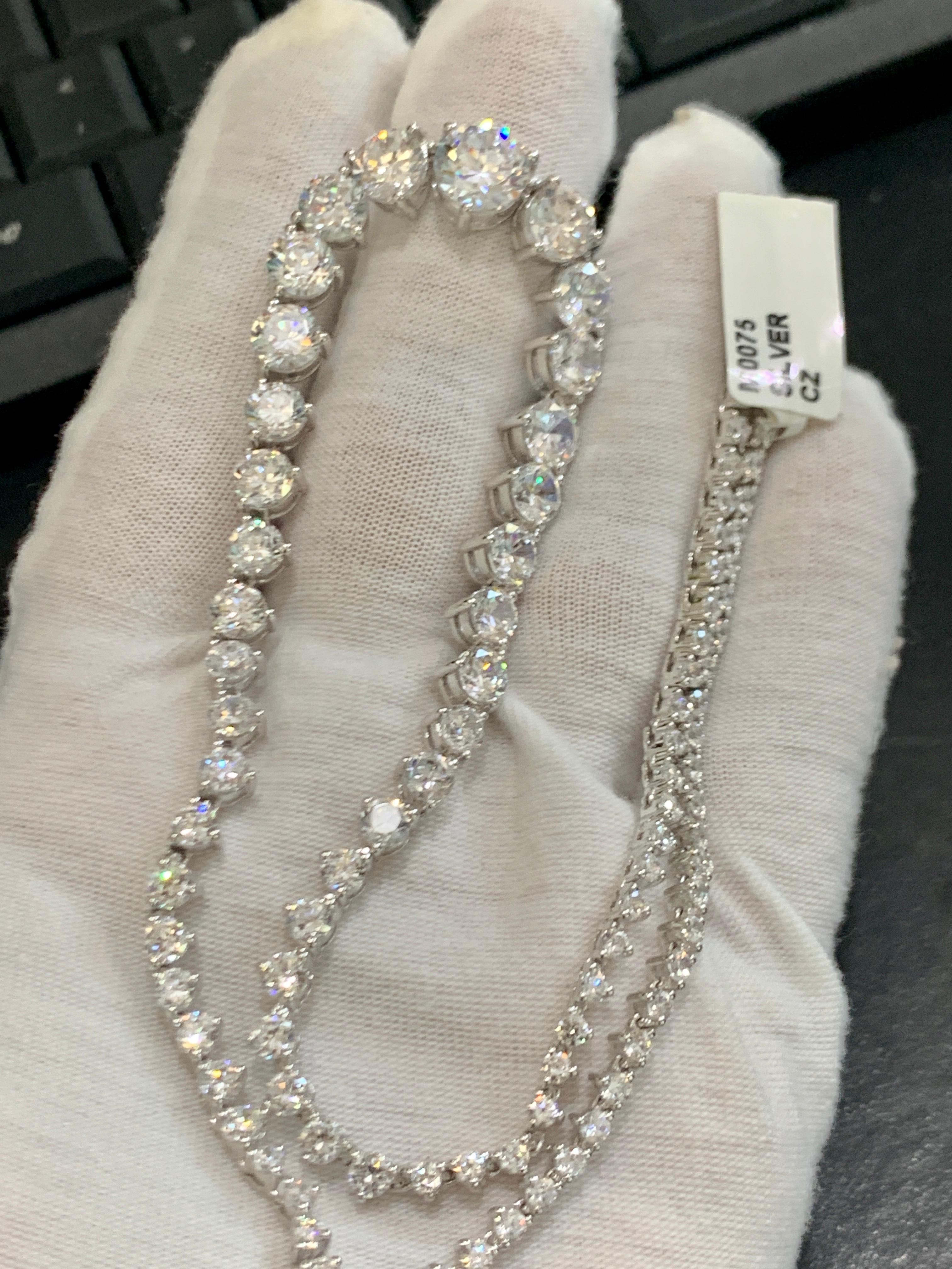 Graduating Tennis Rivera Necklace in Sterling Silver & Solitaire Cubic Zirconia In New Condition In New York, NY