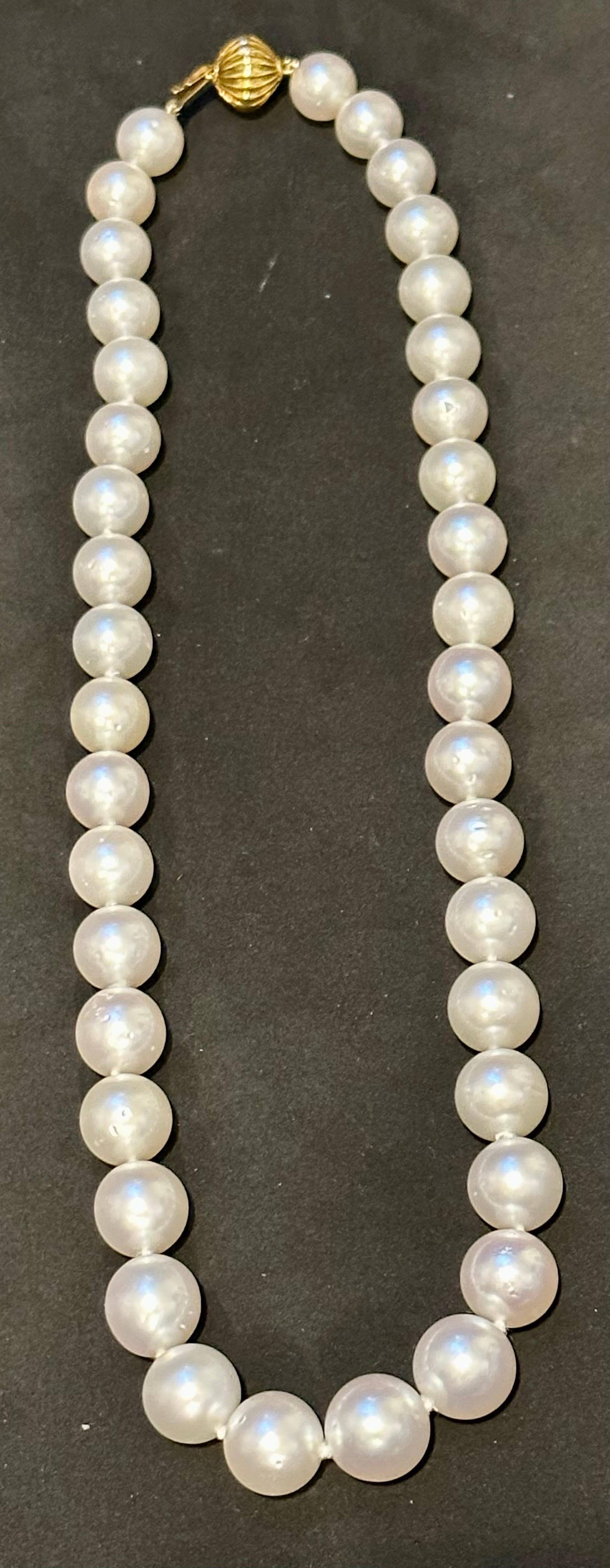 Round Cut Graduating White South Sea Pearls 9-12mm Strand Necklace 14 Kt Yellow Gold Clasp For Sale