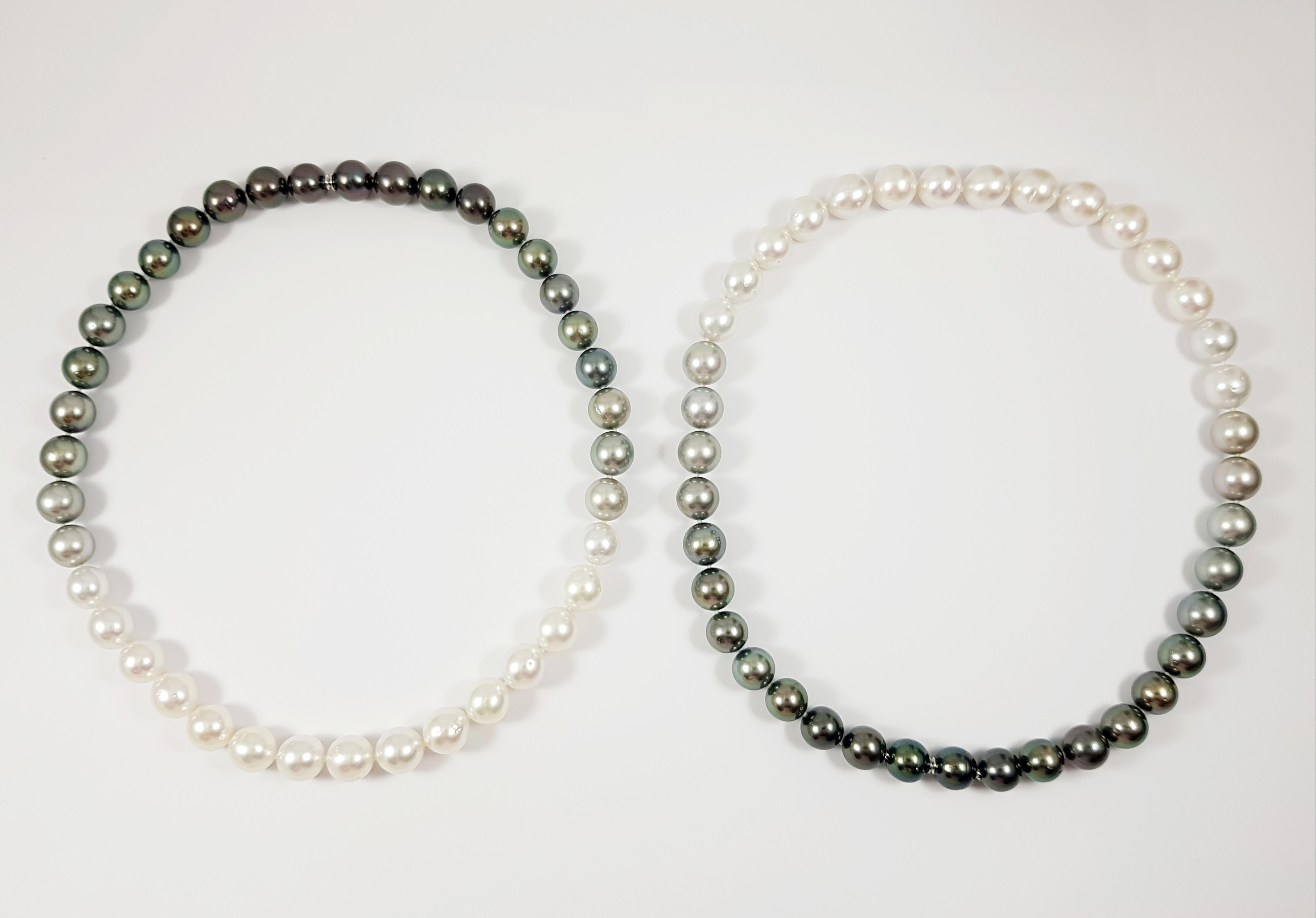 Gradutated Color South Sea Pearl Necklace with Hidden 18K White Gold Clasp 
The two strands can be worn as individual necklaces or combined into a long necklace.  Additionally, each necklace offers graduated color from black pearl to white pearl,