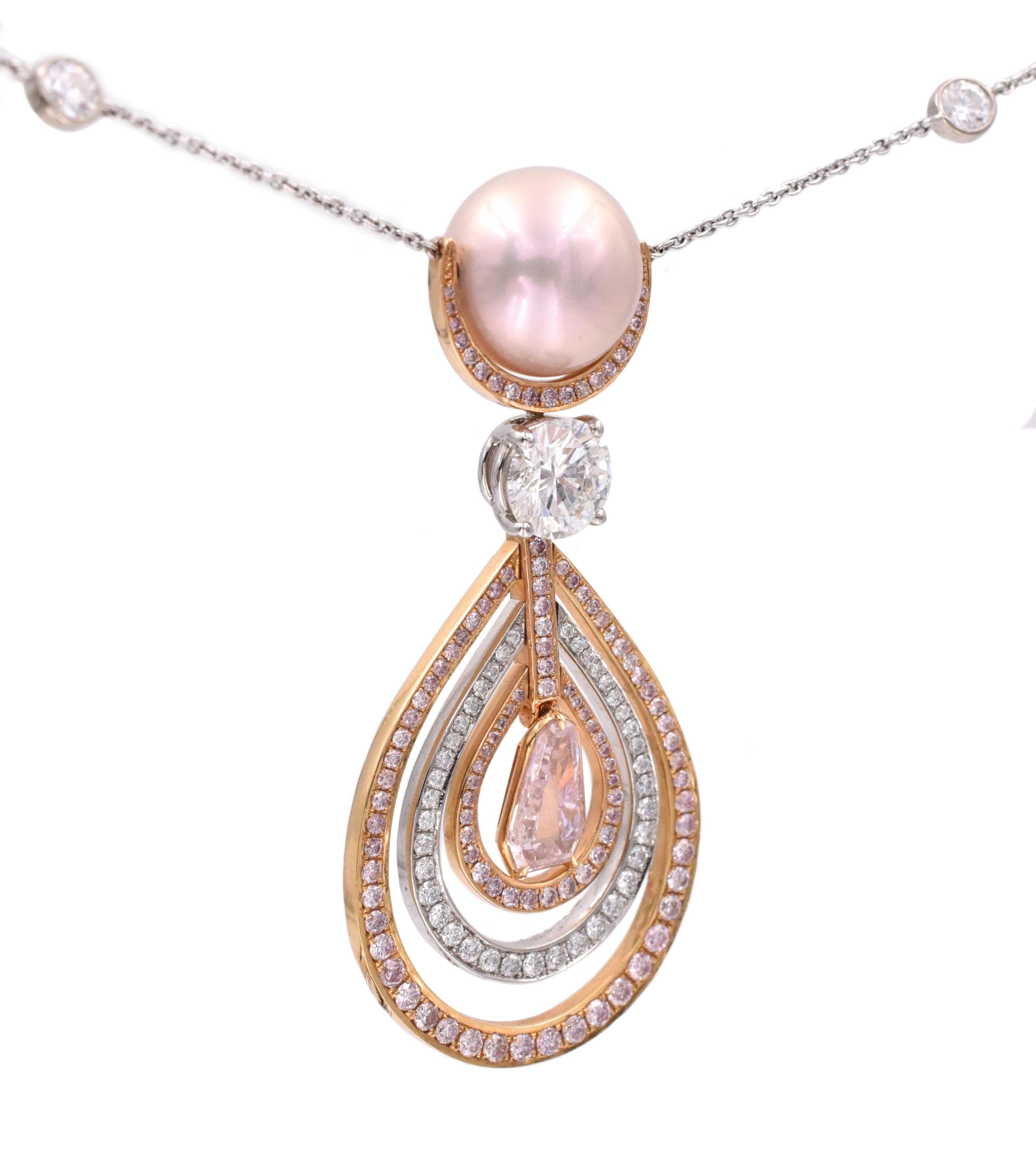 Pearl and diamond necklace by Graff. Suspended on the diamond by yard necklece set with 12 round brilliant cut diamonds, clolor: E/F, clarity:VS+, total weight: 1.41ct, centerpiece set with the pink round pearl 11mm, surrounded by pink diamonds,