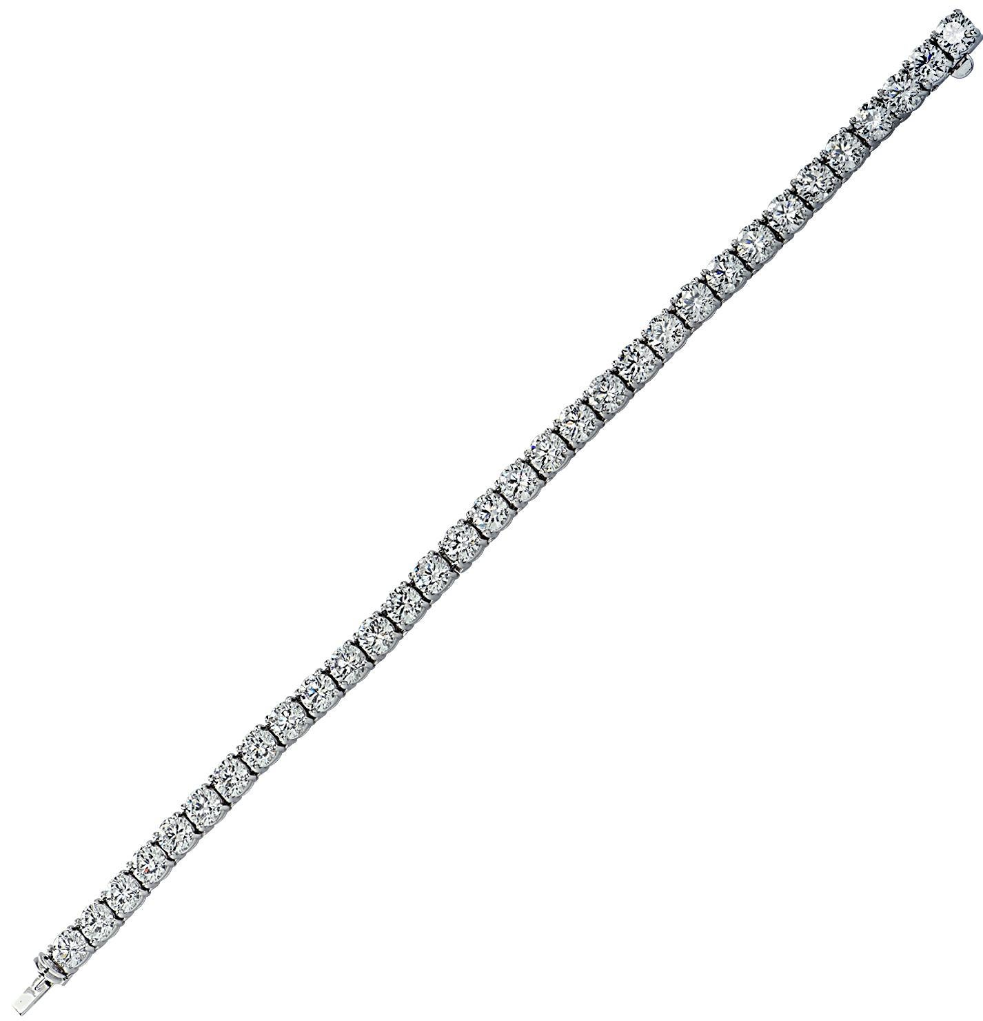 Spectacular Graff tennis bracelet crafted in platinum, featuring 32 sensational round brilliant cut diamonds weighing 16.32 carats total, F-H color, VVS-VS clarity. The radiance of each diamond is able to powerfully radiate, creating a stream of