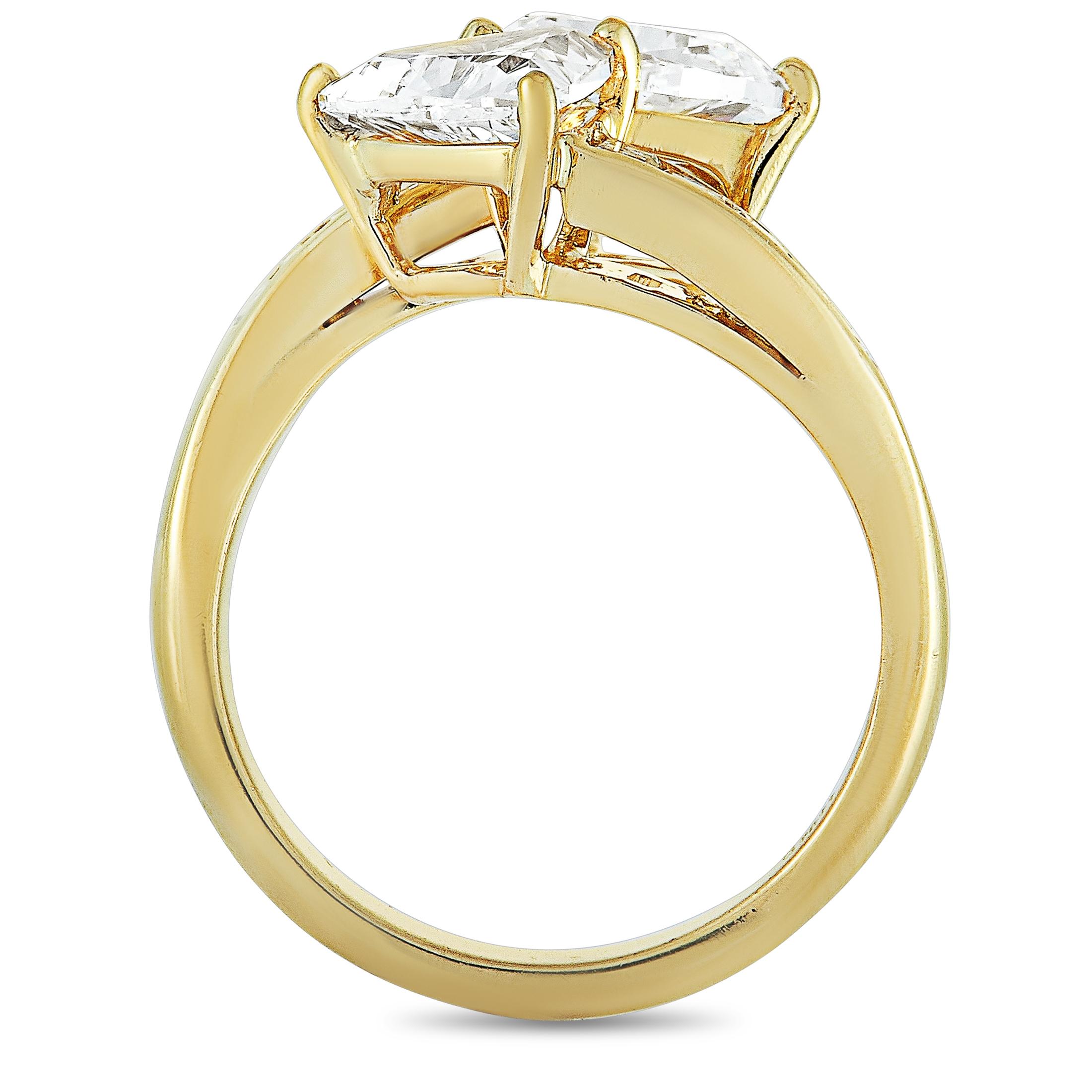 This Graff ring is made of 18K yellow gold and weighs 7.2 grams. It boasts band thickness of 3 mm and top height of 7 mm, while top dimensions measure 17 by 17 mm.
 
The ring is set with a total of approximately 3.10 carats of diamonds, with the