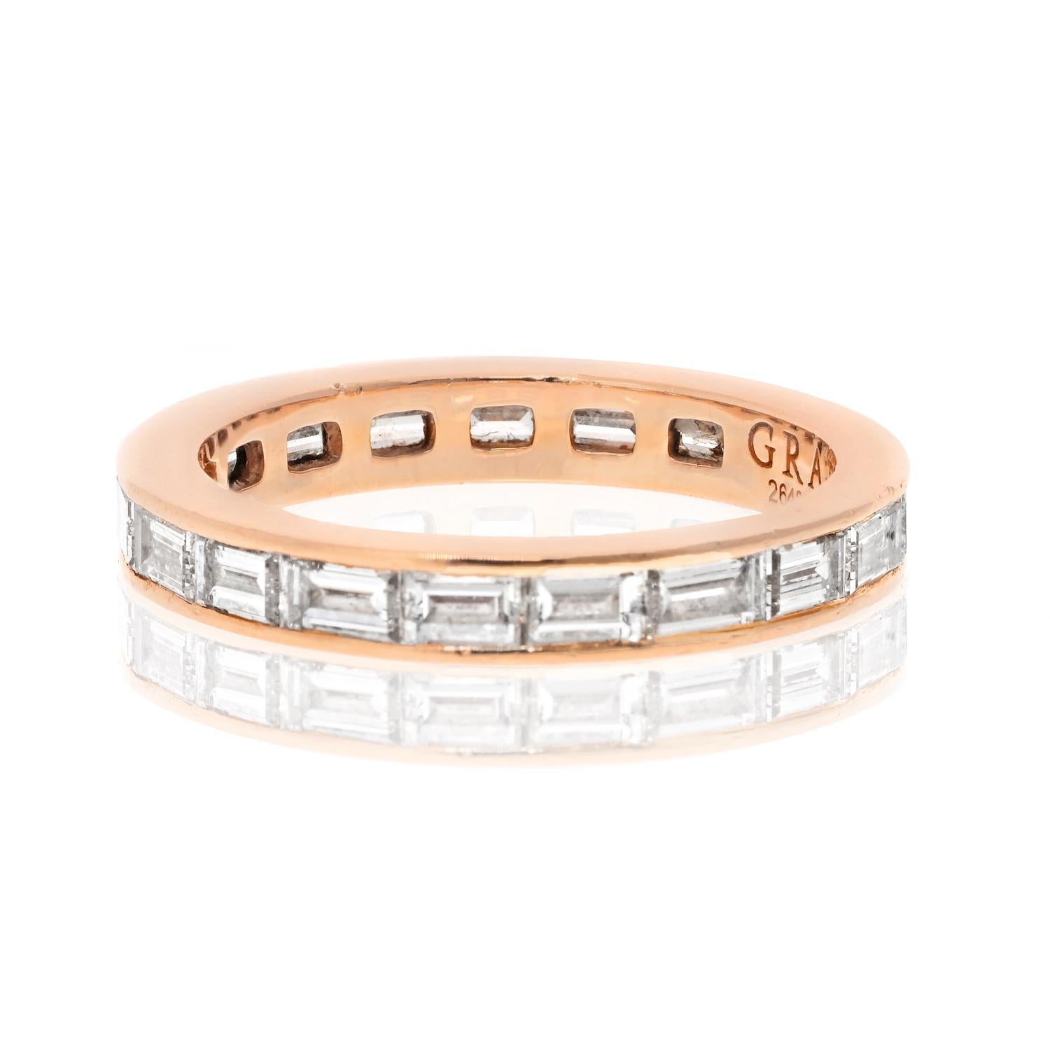 The Graff 18K Rose Gold Baguette Diamond Eternity Band is a stunning piece of jewelry that exudes elegance and luxury. 

This eternity band is crafted with 18K rose gold and features channel-set baguette cut diamonds that are placed horizontally