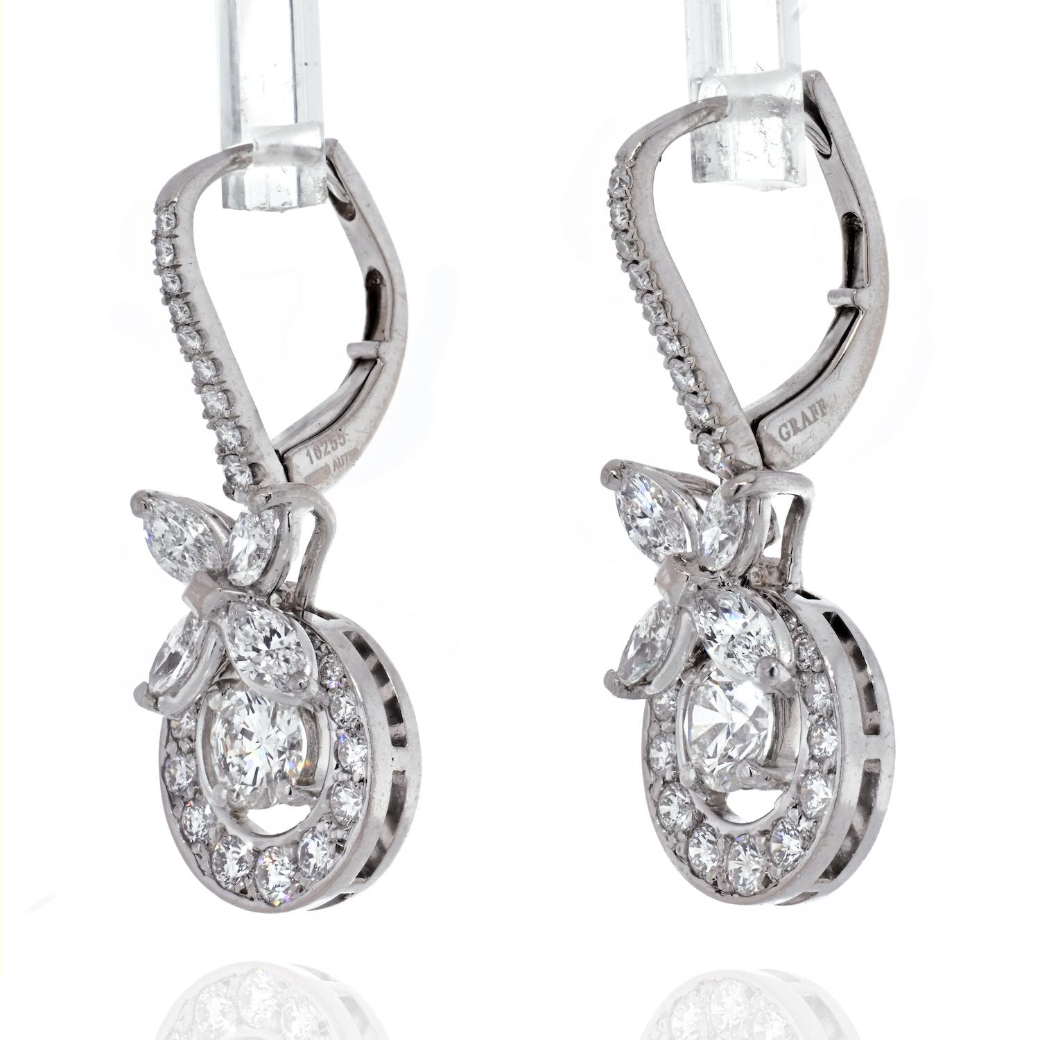 In these 18K white gold drop butterfly earrings, diamonds are impeccably matched by Graff's master craftsmen. Designed to catch the light with the wearer's every gesture, elegant marquise shape diamonds are suspended beneath the delicate diamond