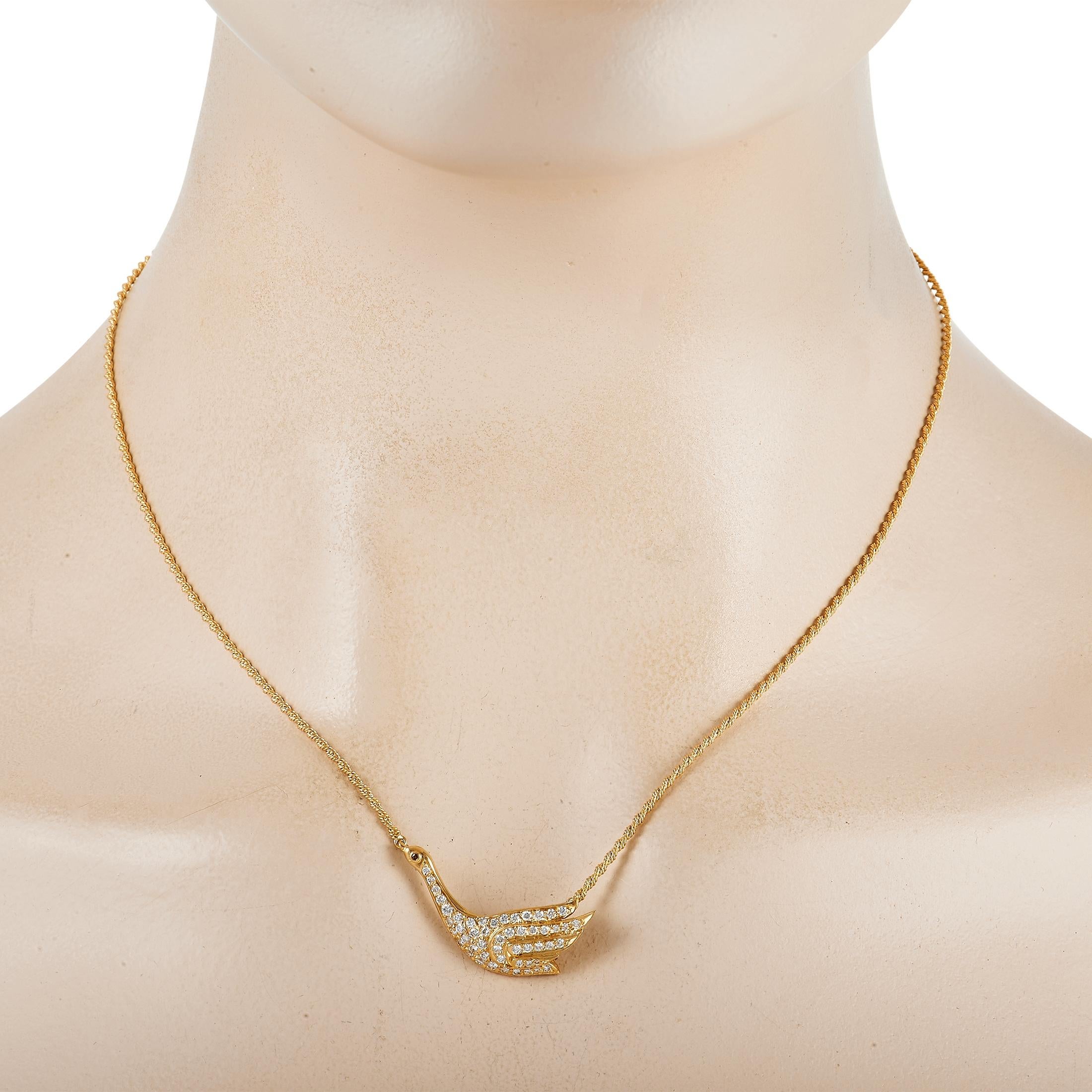 This 18K Yellow Gold Graff necklace is simply exquisite. Suspended at the center of a textured chain measuring 16” long, you’ll find a charming swan-shaped pendant measuring 1” long and 0.5” wide. It sparkles to life thanks to an array of inset