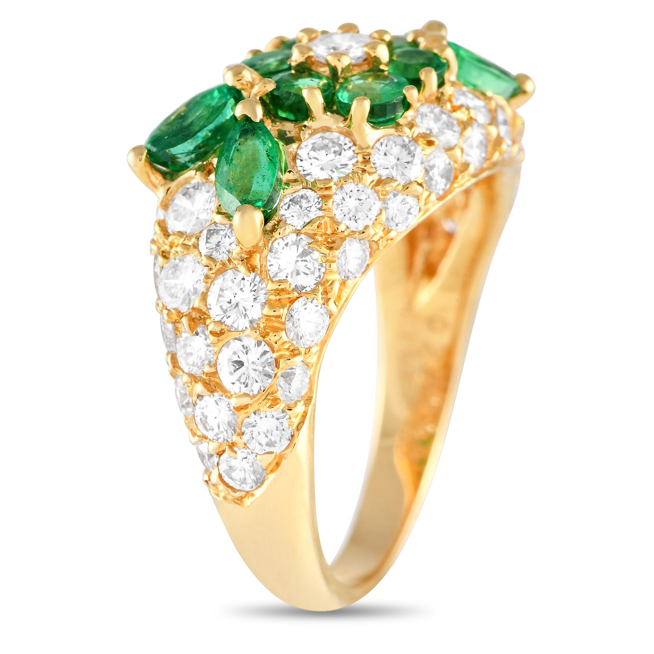 Sparkling diamonds with a total weight of 2.26 carats and emerald gemstones totaling 1.57 carats in a floral pattern make this Graff ring simply spectacular. Crafted from 18K yellow gold, this dazzling ring features a 3mm wide band and a top height