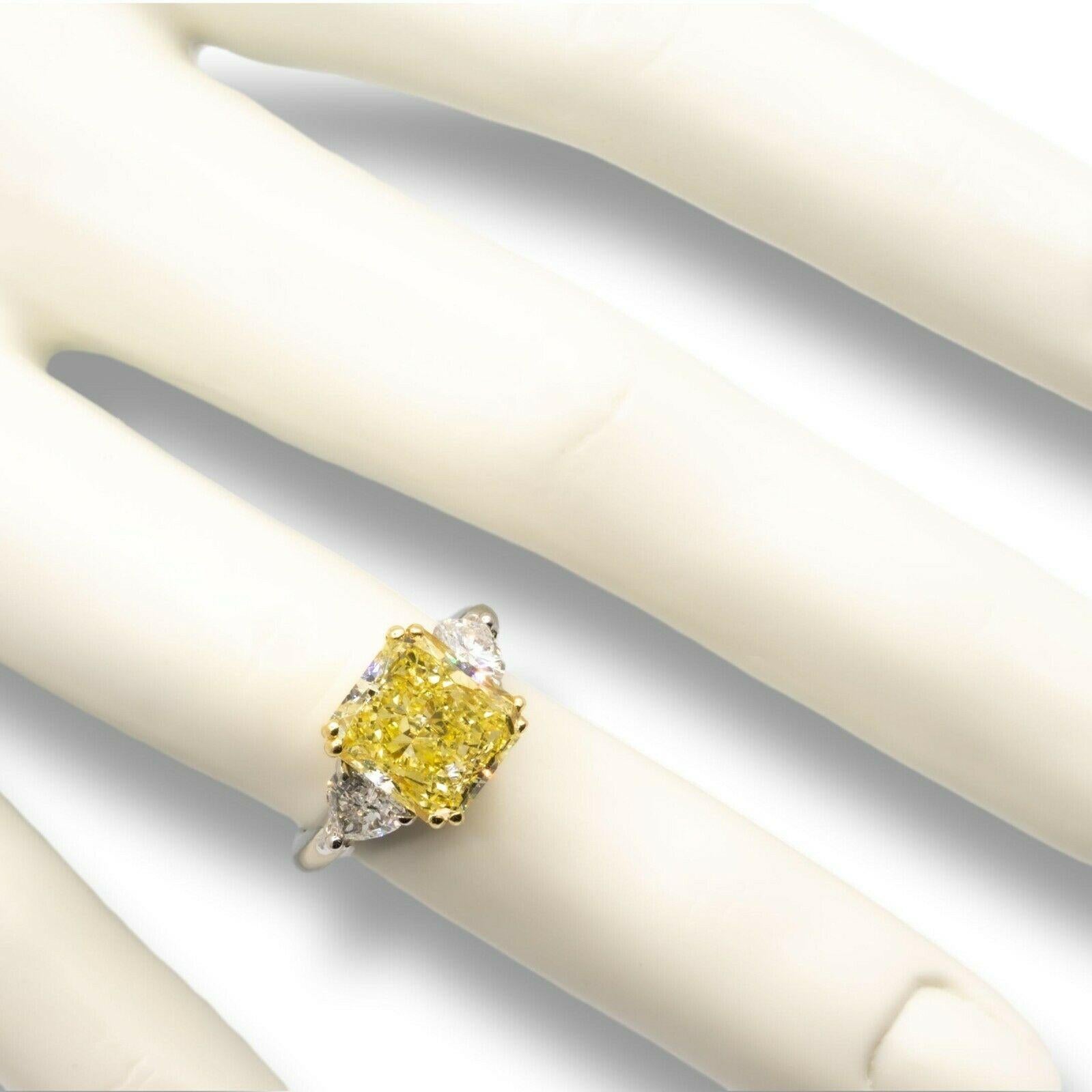 radiant cut yellow diamond ring