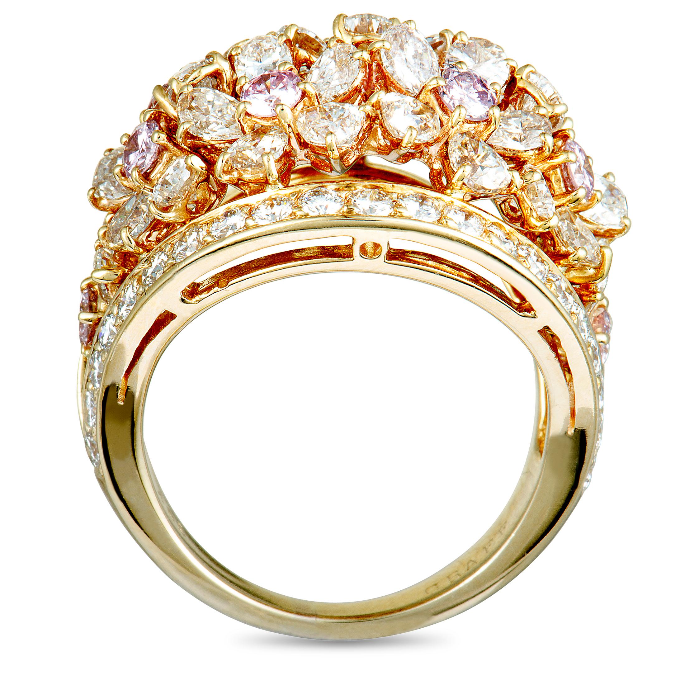 A stunningly resplendent fusion of enticing extravagance and sublime femininity, this fabulous ring presented by Graff is expertly crafted from luxurious 18K yellow gold and lavishly decorated with lustrous pink and white diamonds that weigh 4.85