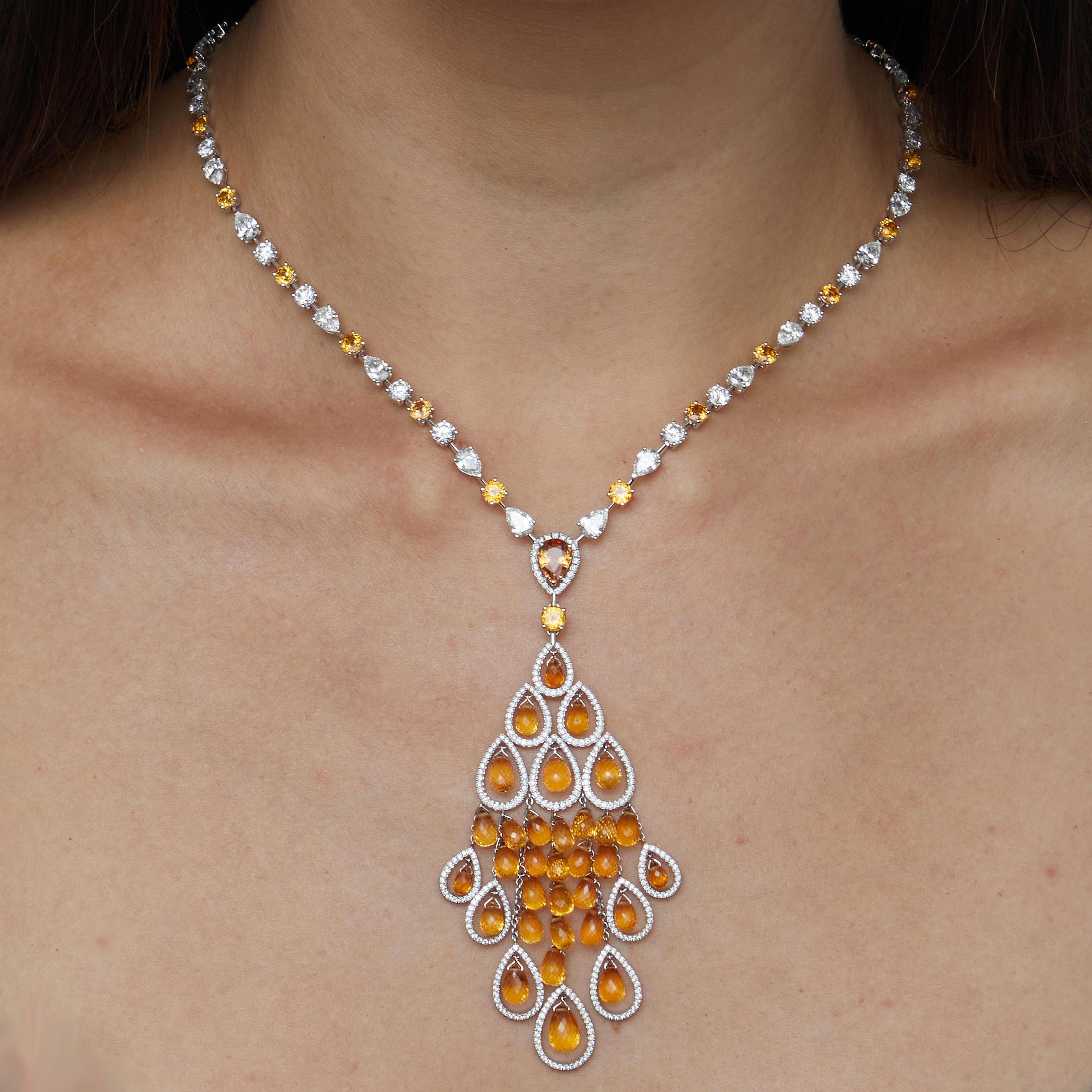An incredible Graff necklace showcasing 57 orange sapphires totalling 43.15ct and diamonds appx measuring 11.95cts in shimmering 18k white gold. This collection has been worn by royalty  specifically Princess Charlene in 2016 to a cocktail