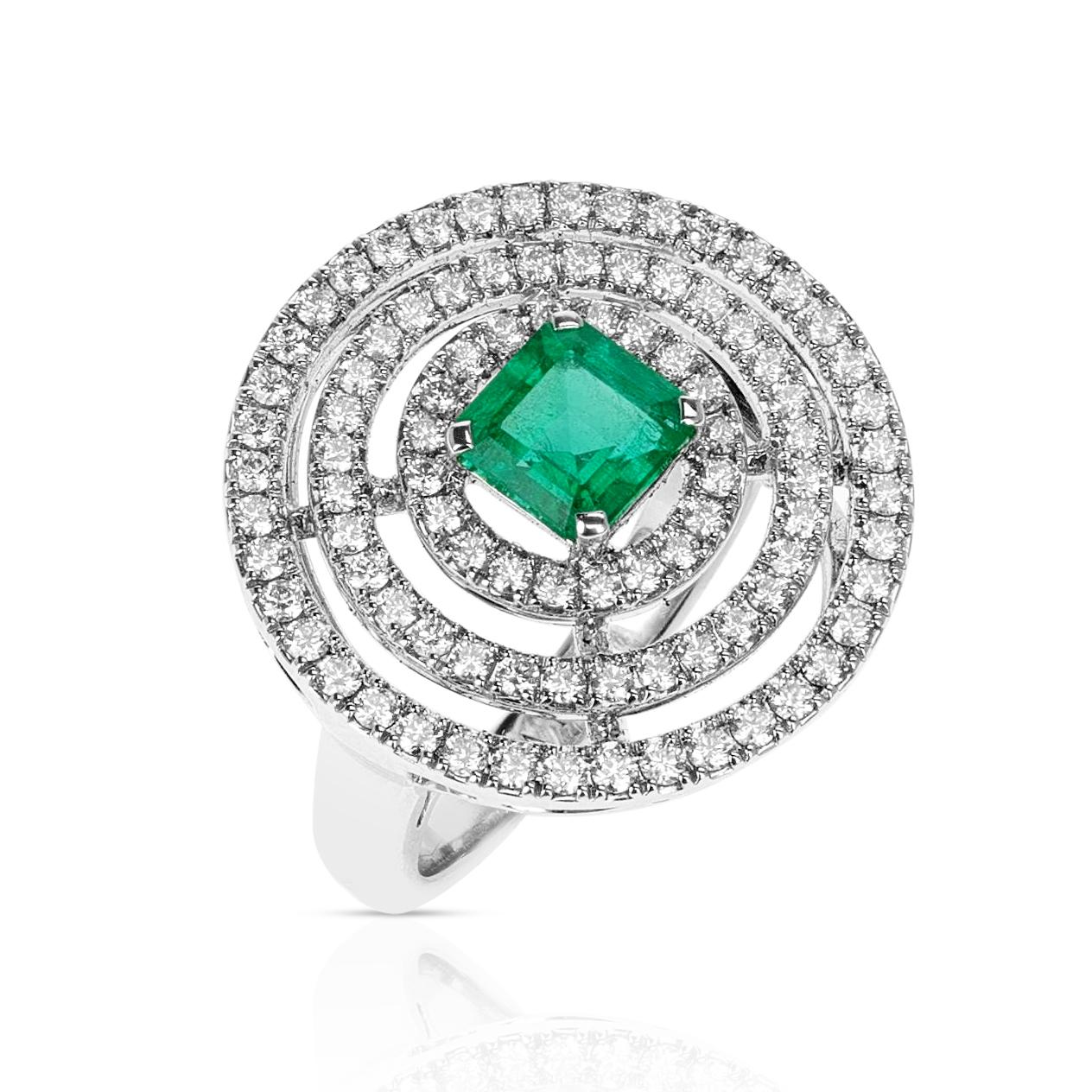 A stunning Graff Bulls Eye Emerald and Diamond Ring, with an Emerald weighing 1.02 carats and Diamonds weighing 0.86 carats. 8.65 grams
Ring Size 6 US. Contains Certificate of Quality.
