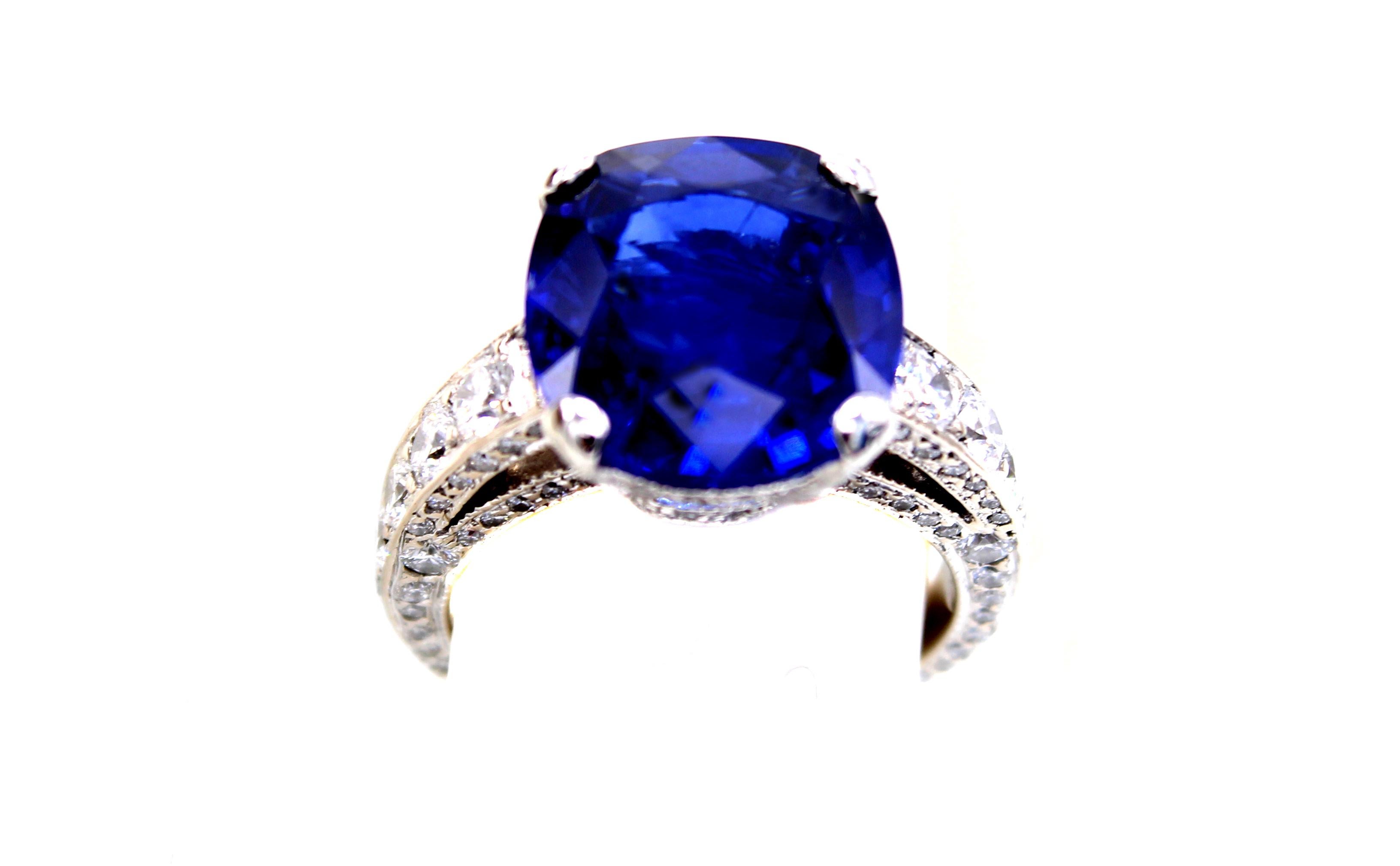 A perfectly cut Burma No Heat cushion is the center piece of this exquisite ring by the renown London jeweler Laurence Graff. The 6.61 carat Burmese sapphire is accompanied by a report from AGL stating the origin as Burma and enhancement as none. 