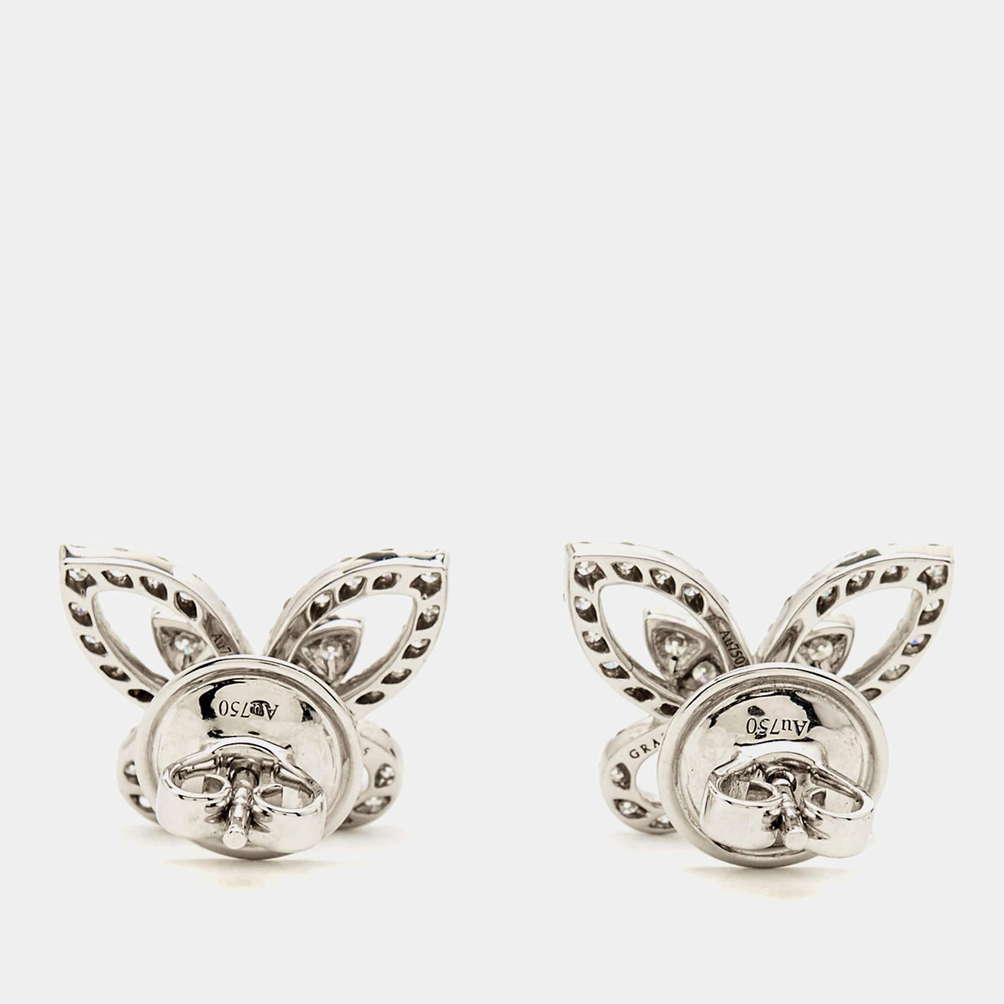 The 'butterfly' has long been a signature symbol of Graff, and it does make a dazzling appearance in this breathtaking pair of earrings! This stunning pair comes crafted from 18K white gold featuring a cut-out butterfly motif beautifully set with