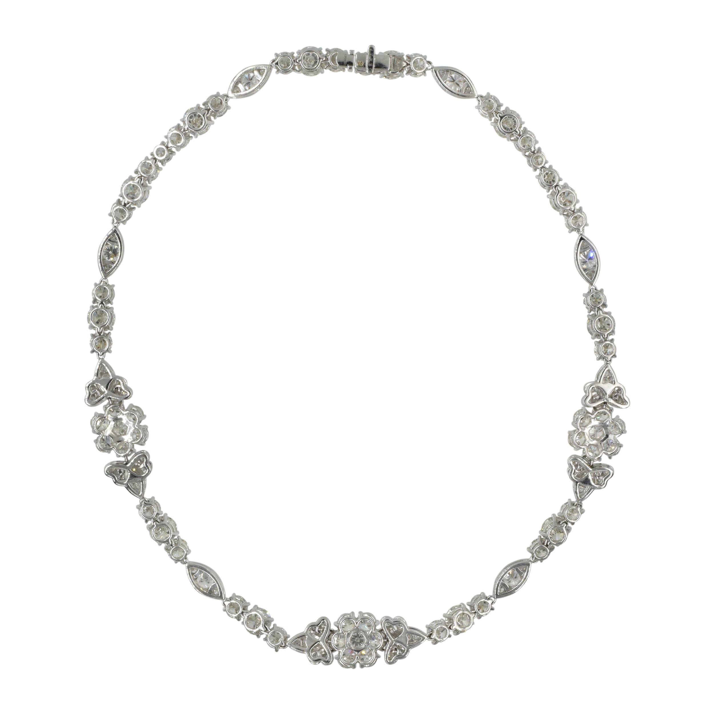 Graff Diamond  Necklace This diamond necklace has a floral design with circular-cut diamonds
weighing a total approximately of  37.49 carats very fine quality diamonds all set in platinum and white gold,
Signed Graff, no. GNxxxx 
Length: 15.75