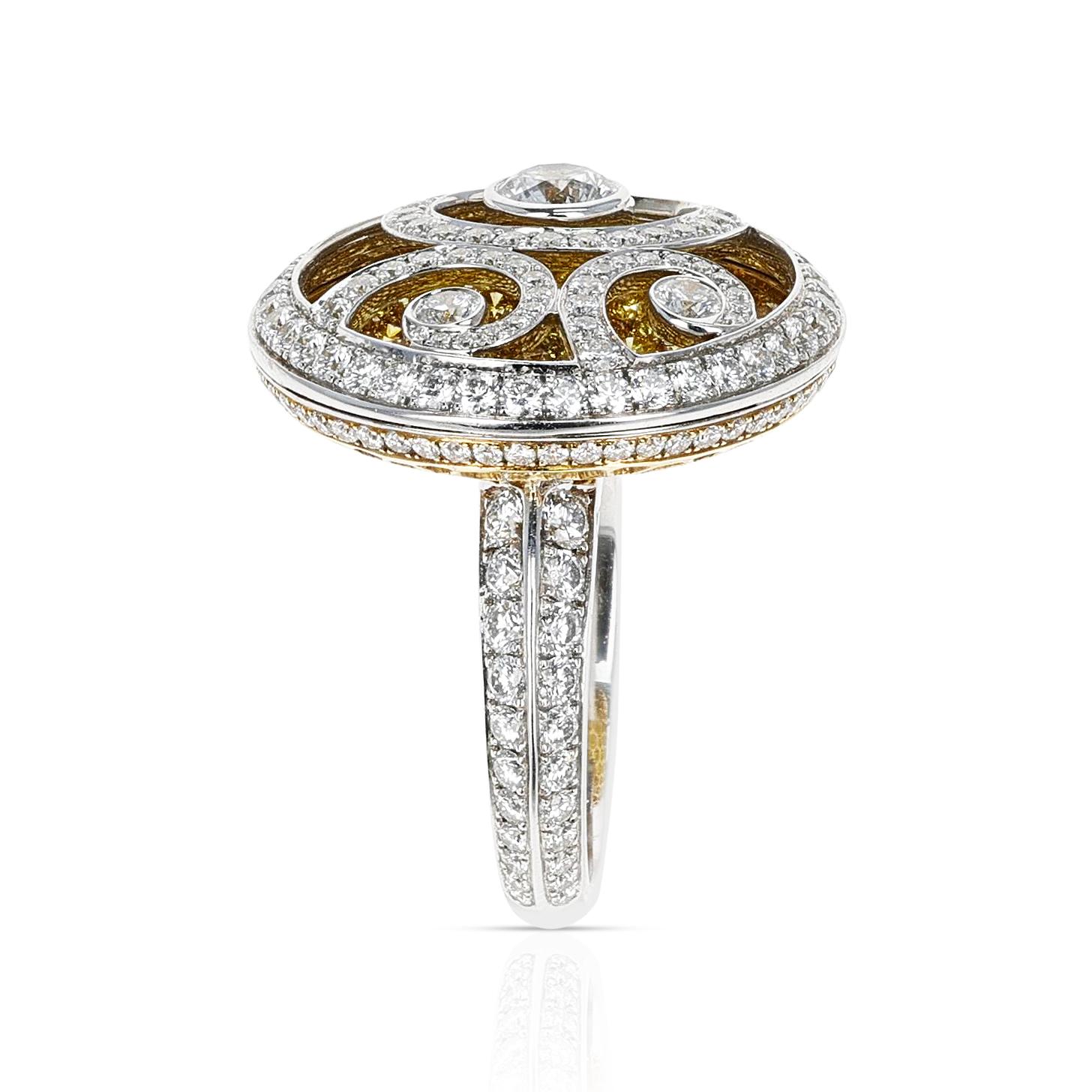 An exceptional and chic white diamond and yellow diamond cocktail ring, coined Diamond on Diamond, by Graff. The ring can be worn in casual and formal environments. It is set with 2.38 carats of Yellow Diamonds and 2.44 carats of White Diamonds.