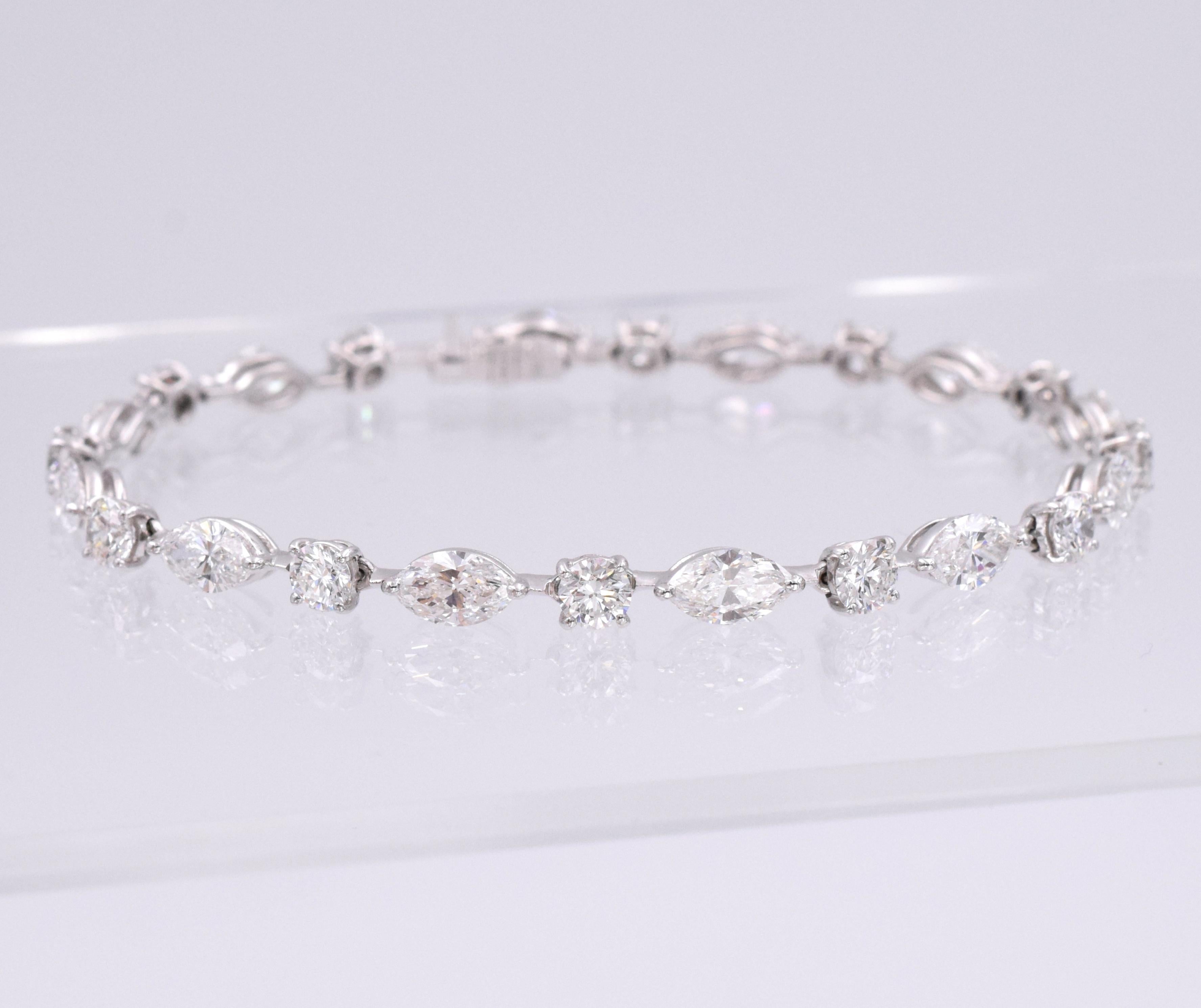 Graff Diamond Bracelet. This bracelet has 24 round and marquise shape diamonds with a total of approximately 10carats, set in 18k white gold. 
12 Marquise shape diamonds app 7 carats ( 0.60 carats each)
12 round shape diamonds app 3 carats (