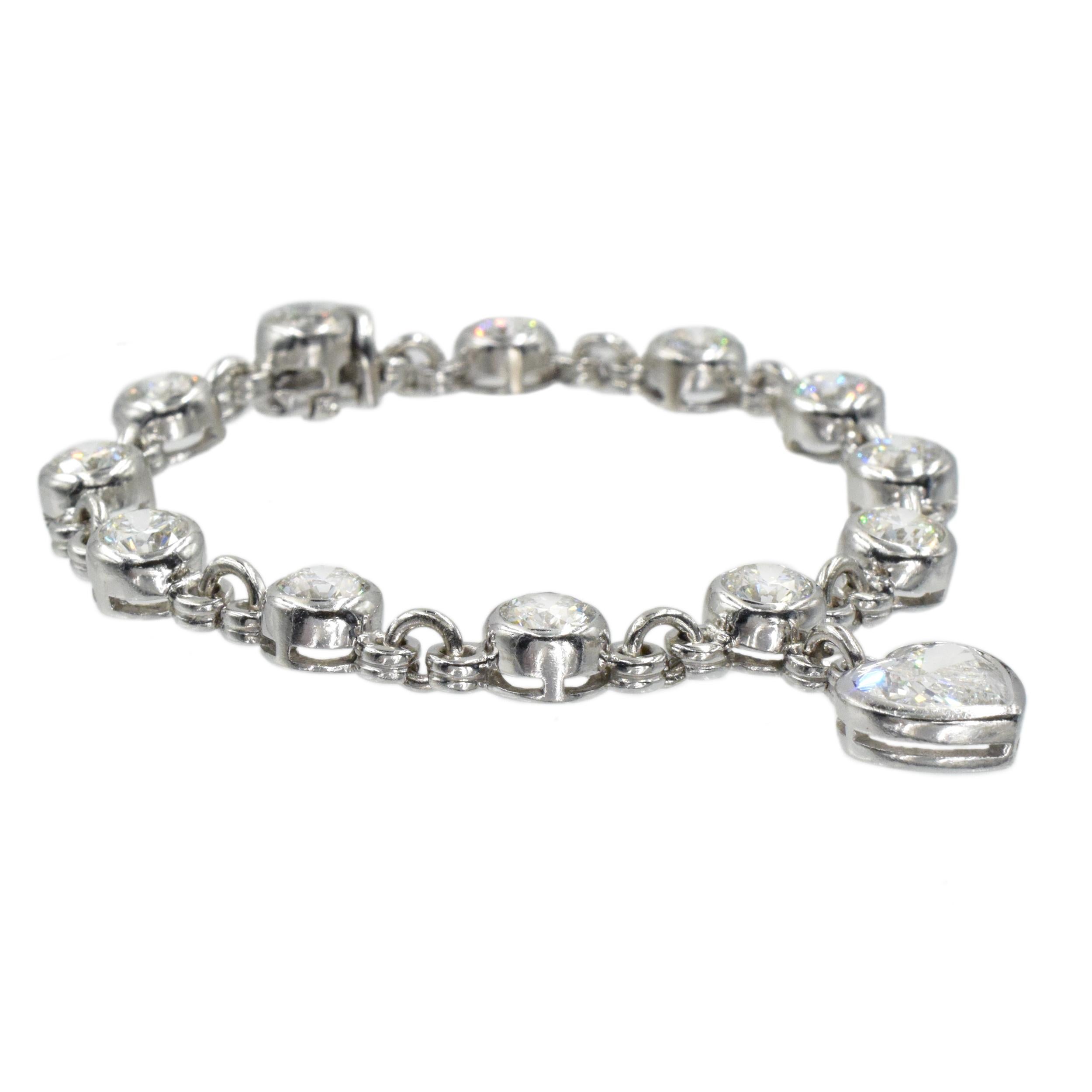 Heart Cut Graff Diamond Charm Bracelet in Platinum