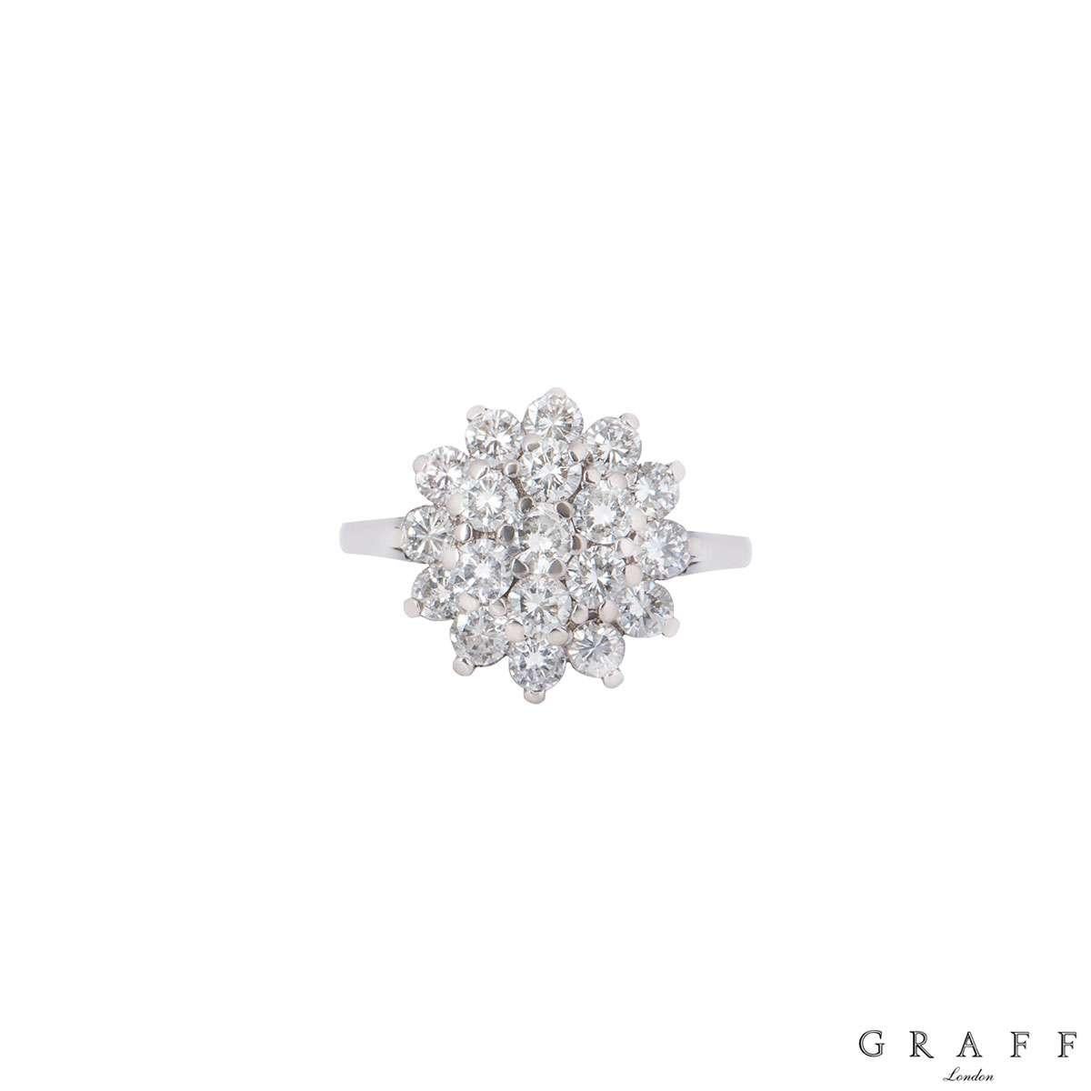 An 18k white gold diamond ring by Graff. The ring features a floral design made up of a cluster of 19 round brilliant cut diamonds with an approximate carat weight of 1.33ct. The ring is size UK N, EU53 and US 6½ but can be adjusted for a perfect