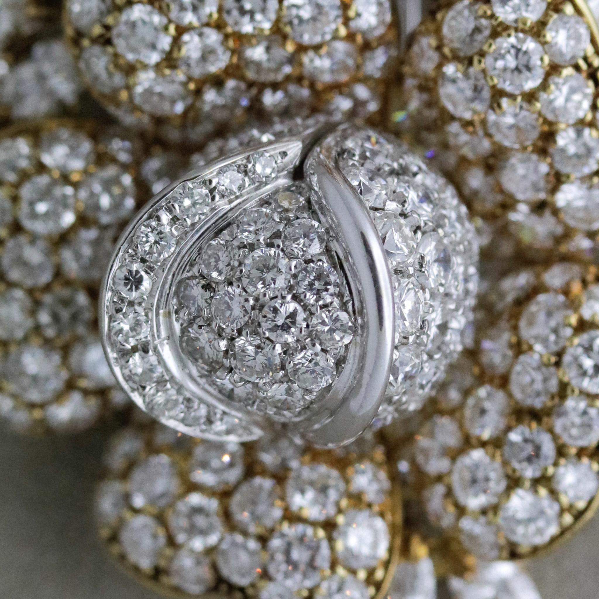 A stunning diamond studded piece by Graff, known for their exceptional world-class diamonds and gemstones. The brooch features approximately 20 carats of diamonds set over a bouquet of 2 blossoming fold flowers. They include round brilliant-cuts set