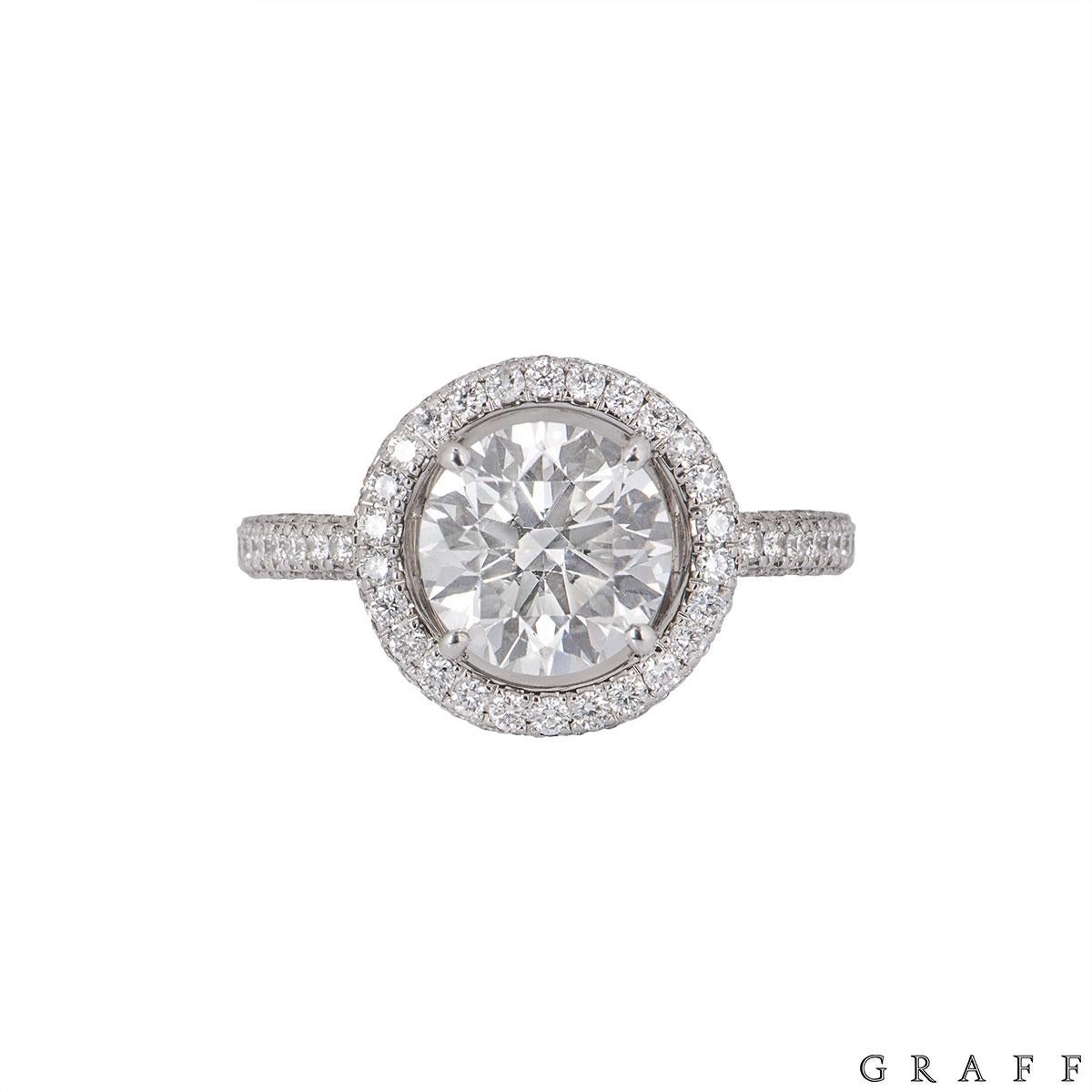 An 18k white gold diamond ring by Graff from the Constellation collection. The ring comprises of a round brilliant cut diamond with a total weight of 2.00ct, F colour and VS1 clarity. Complementing this centre stone are a halo of round brilliant cut