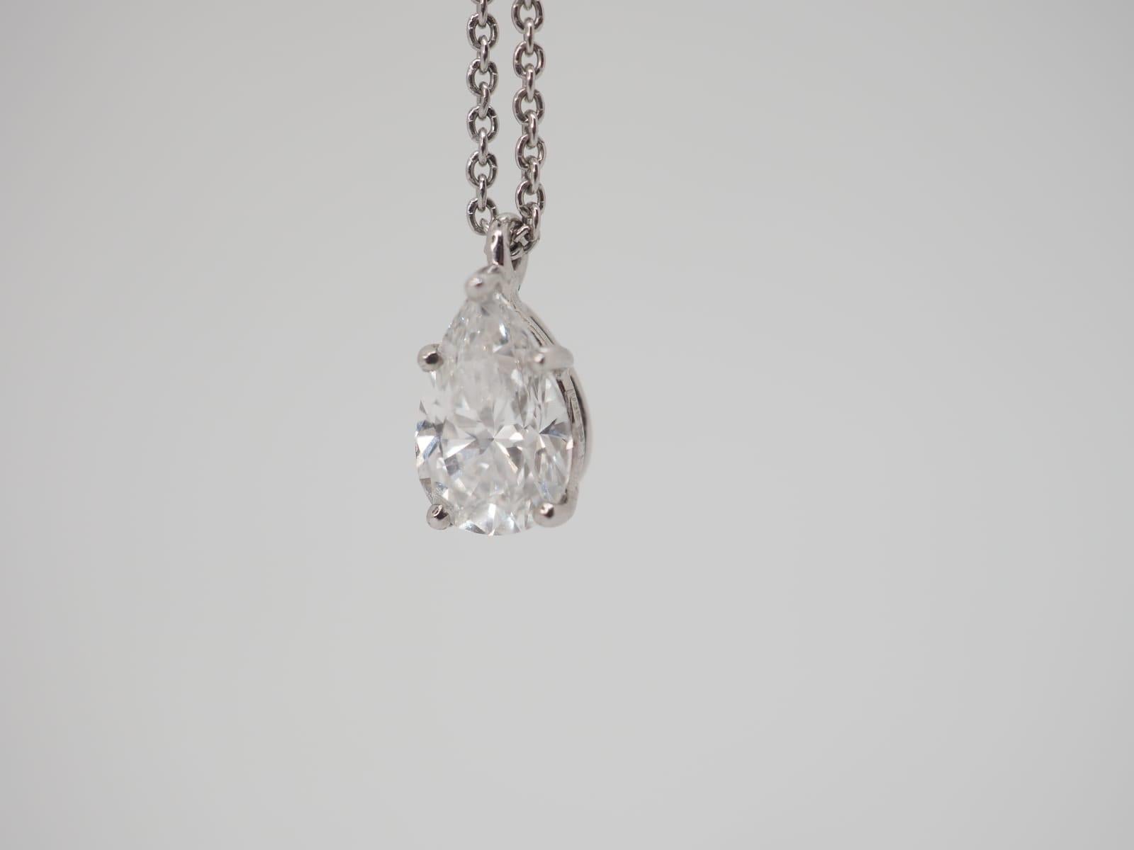 Authentic Graff diamond necklace with an endlessly elegant pear shape diamond pendant is especially alluring, with its streamlined silhouette complemented by a delicate platinum chain that allows the stone to take centre stage. 

Punched:
