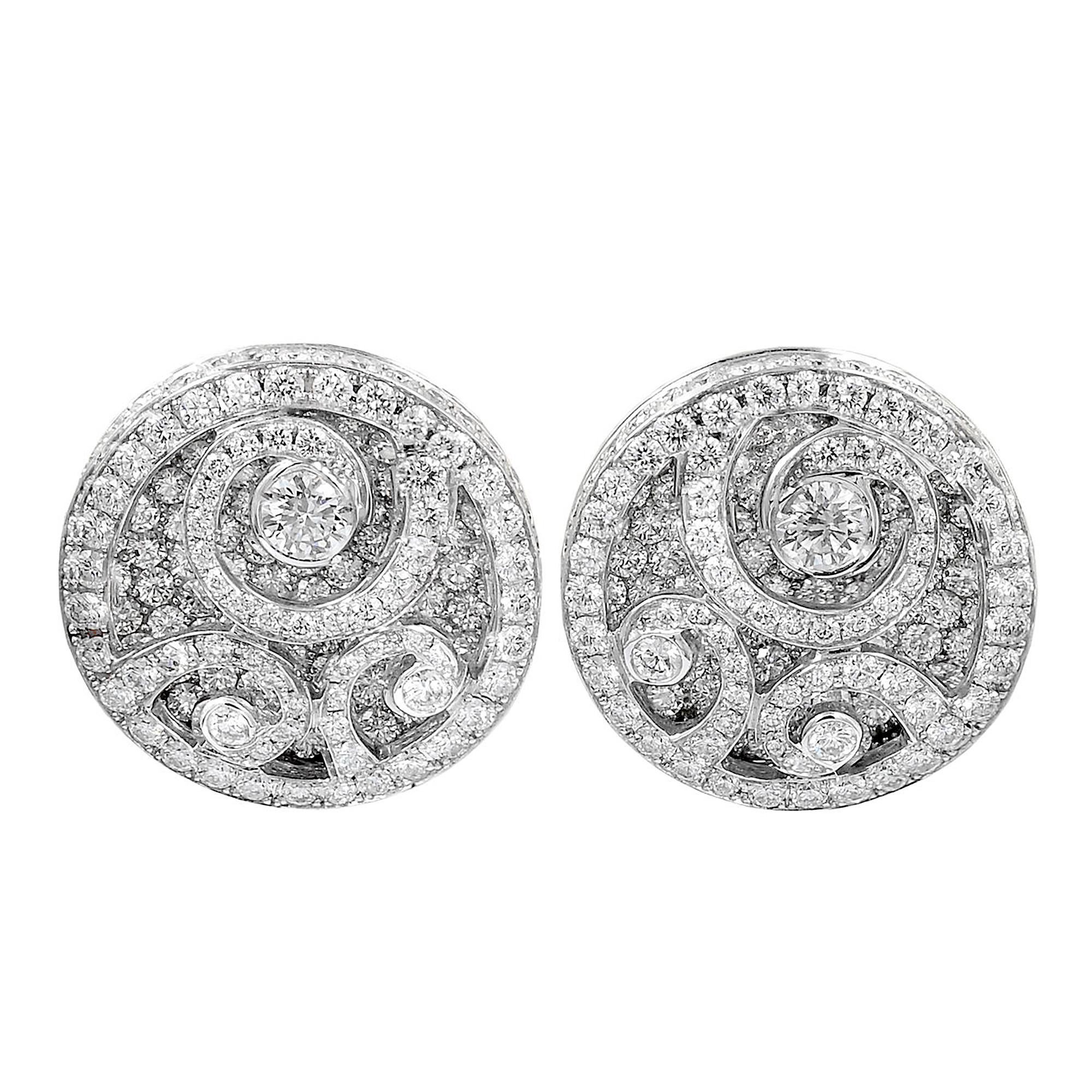 The earring are intricately set with approximately 5.35 carats of diamonds. These diamonds are carefully selected for their exceptional quality and brilliance, ensuring that each earring sparkles with an intense fire and radiance.