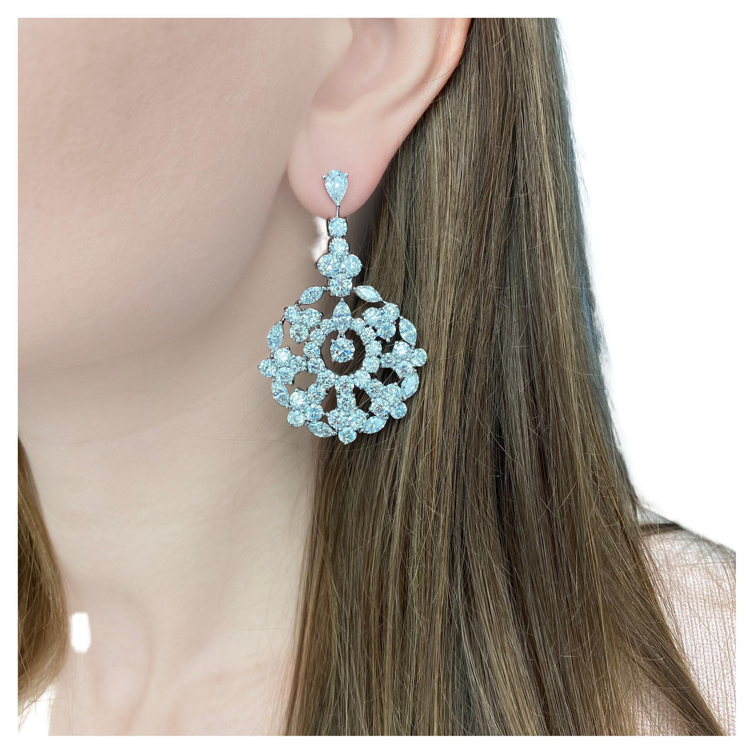 Graff Diamond 'Snowflake' Earrings This pair of earrings has pear, marquise and circular-cut
diamonds weighing total approximately 28.36 carats of very fine quality diamonds all set in 18k white gold, signed Graff, no xxxx, comes with Graff pouch.
