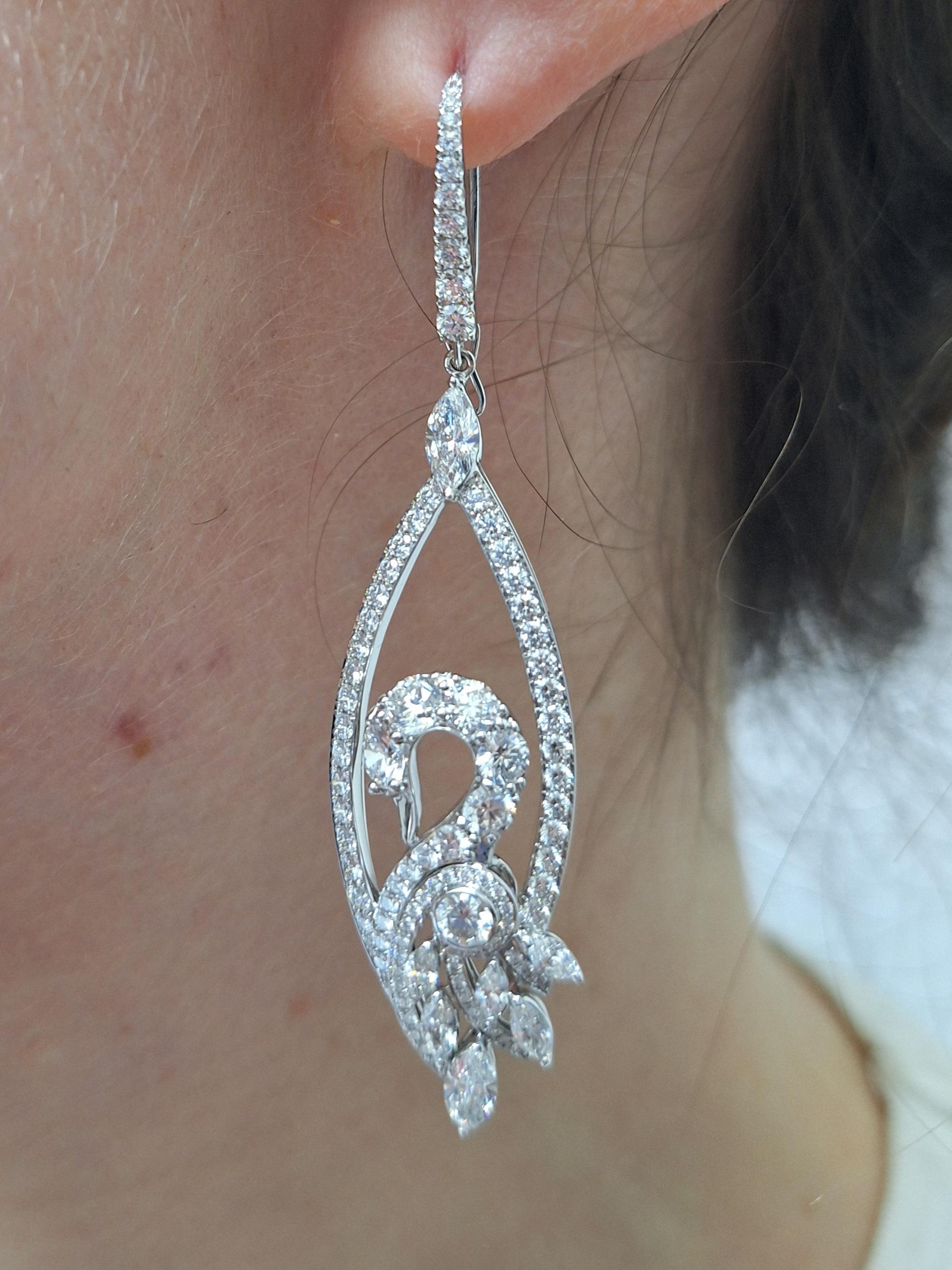 Timeless elegant piece crafted in 18Kt White Gold Graff Diamond Swan Necklace & Earrings Set features:

Necklace: 25 Marquise Cut Diamonds approx. 3.16Ctw & 141 Round Cut Diamonds approx. 8.11Ctw

Earrings: 14 Marquise Cut Diamonds approx. 2.17Ctw &