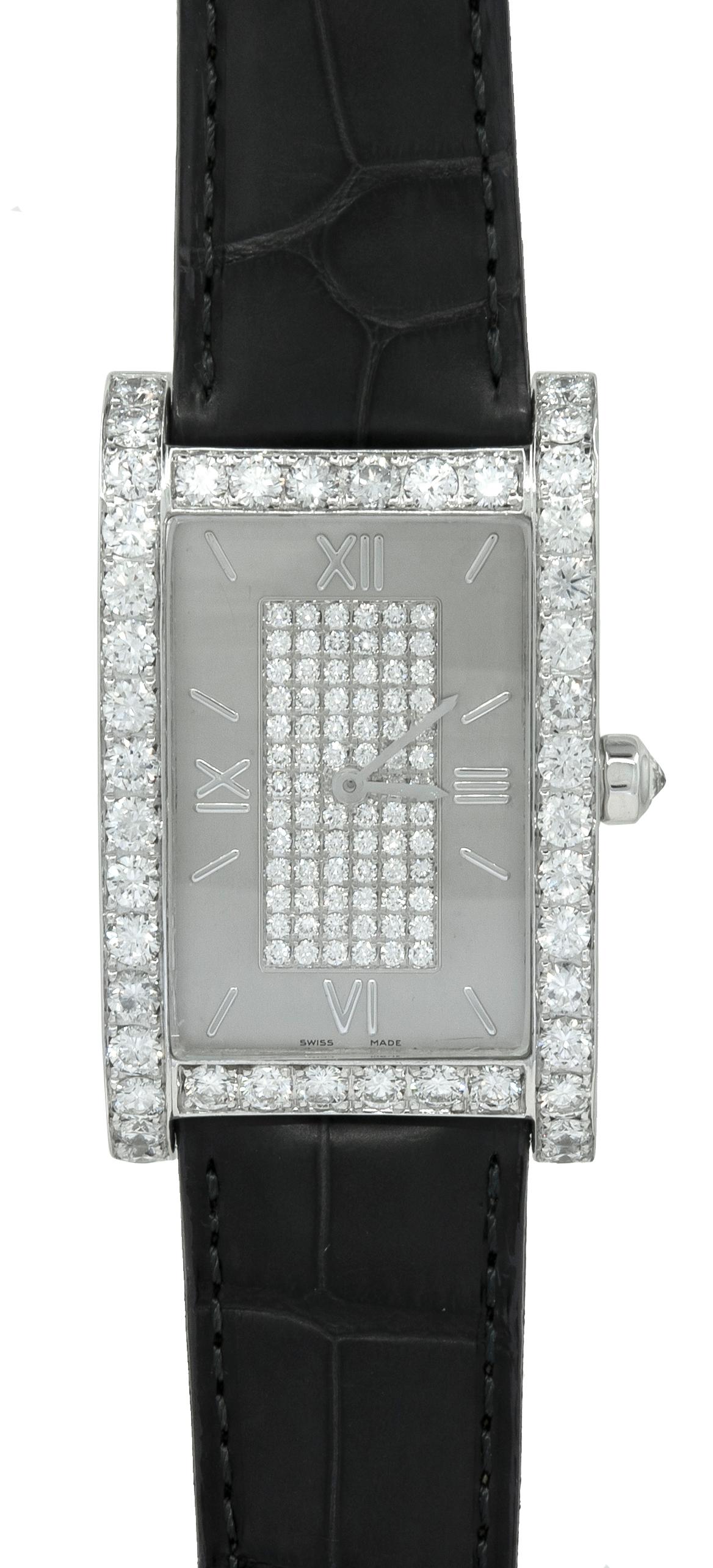 GRAFF Diamond Wrist Watch

An 18k white gold watch, set with round brilliant-cut diamonds and alligator strap signed Graff.

 