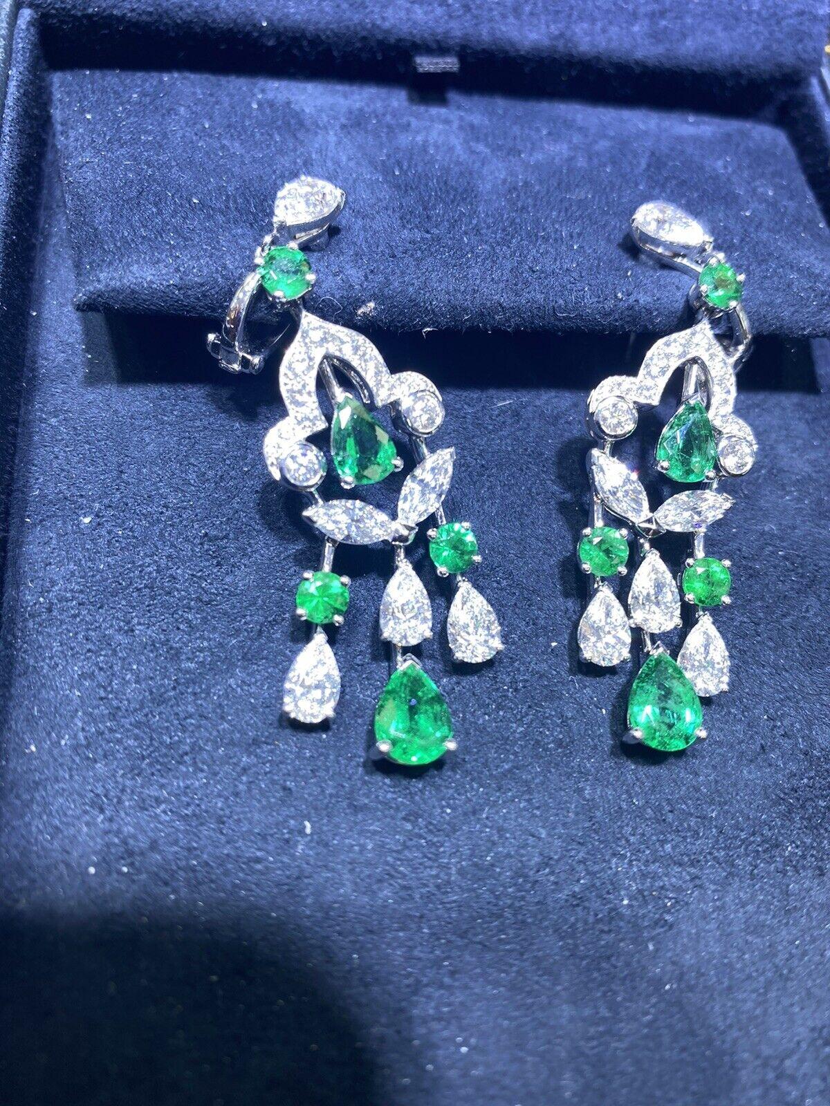 GRAFF EMERALD AND DIAMOND EARRINGS.


STONES: circular-cut and pear-shaped emeralds of approximately 4.38 carats total, circular and marquise-cut and pear-shaped diamonds of approximately 6.10 carats total

SIGNATURE: Graff

MARKS: no.