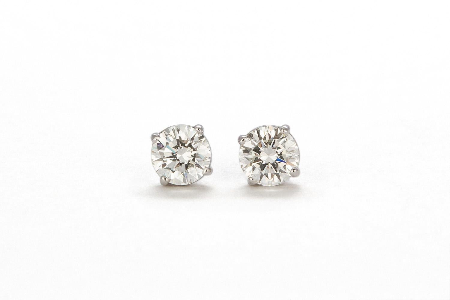 We are pleased to present these GRAFF GIA Certified & Laser Inscribed 18K White Gold & Diamond Stud Earrings 2.08ctw I/VVS2. These beautiful earrings feature two GRAFF GIA certified 1.04ct I/VVS2 Round Brilliant Cut Diamonds set in GRAFF 18k White