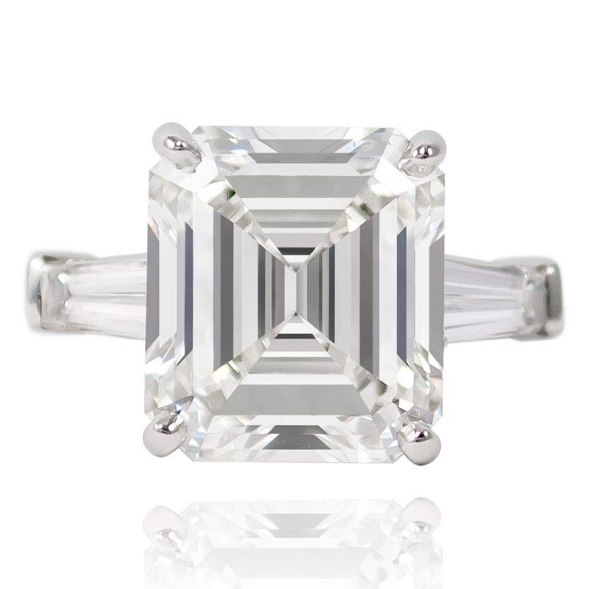 This incredible signed piece by Graff features a GIA Certified Emerald cut diamond = 7.28 carats flanked by a pair of tapered baguettes. The impeccable craftsmanship and timelessness of design is present in this ring and will be enjoyed for