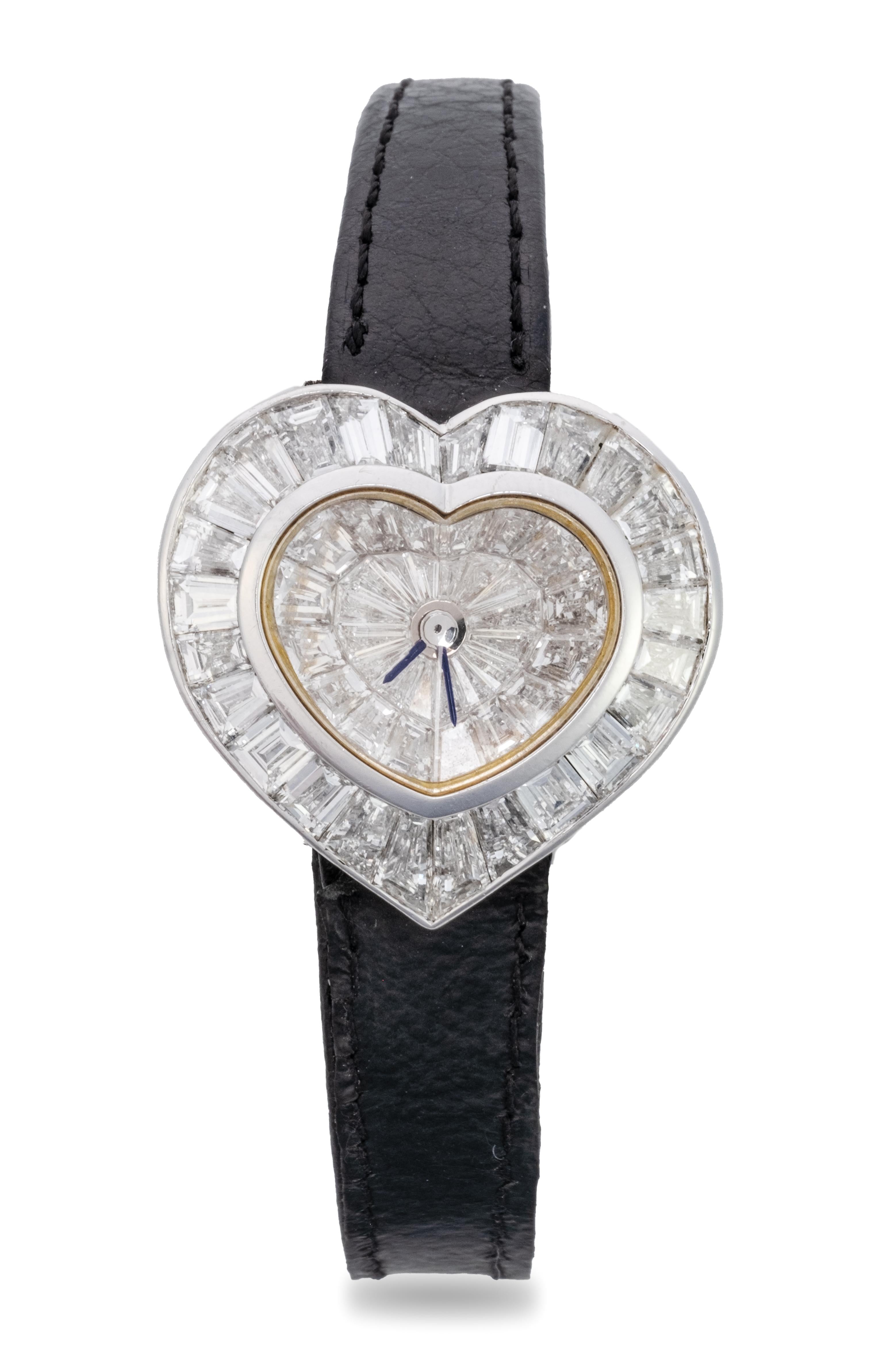 The amazing heart inside of heart-shaped dial set with tapered baguette-cut diamonds, diamonds very approx. 7.90cts total, signed Graff, accompanied by original extra fittings including deployment clasp
28.8mm x 27.9mm approx, Strap: 8.25