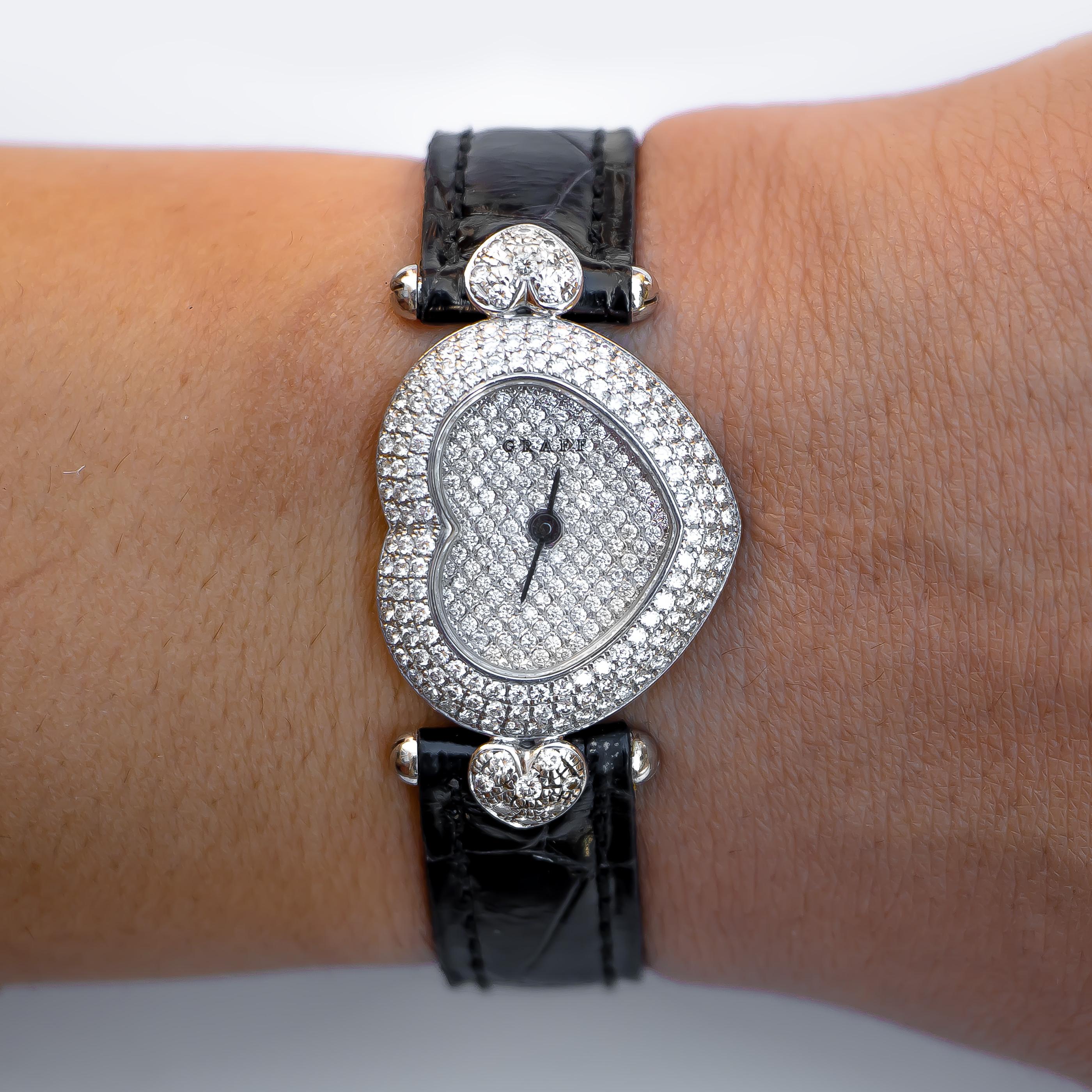 Graff London Limited Edition Diamond Heart Shape Casse Ladies Wristwatch

Brand: Graff London

Diamonds: 2.80 Carats
Color: F, Clarity: VS

Metal: 18K White Gold 

Bracelet: Authentic Graff Genuine Aligator 

Condition: Great (Previously Owned)

New