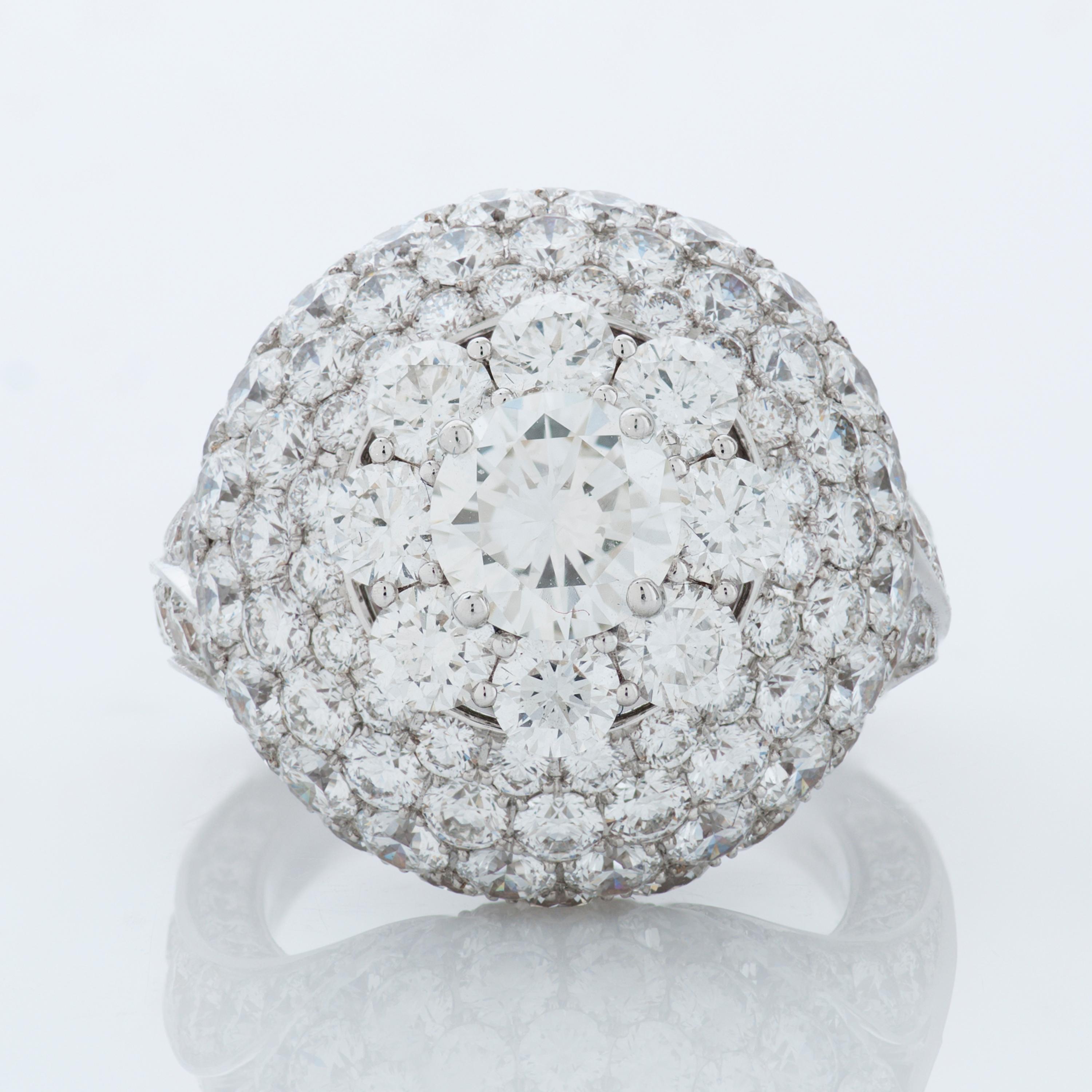 Graff Bombe ring in 18k white gold, accompanied by a GIA report and Graff certificate of quality. 

This ring features a GIA certified 1.00 carat round brilliant cut diamond with G color and VVS2 clarity. There are an additional 8.90 carat of fine