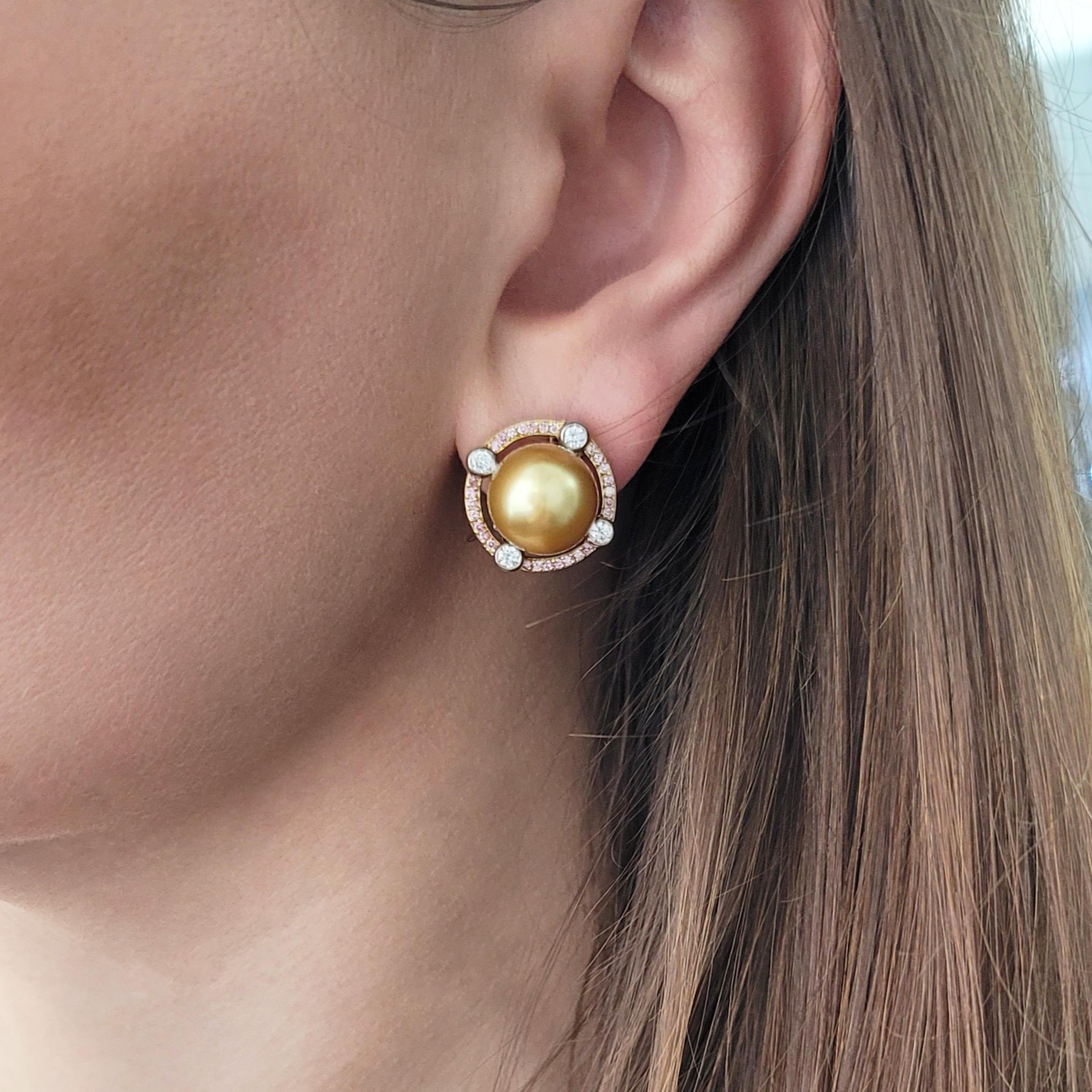 Graff Pink and White Diamond with Yellow Pearl Earrings in 18k white and yellow gold. Circa 1980's. This pair of earrings features two 15mm round golden color pearls set in the center, surrounded by a halo of 56 pink round brilliant cut diamonds,
