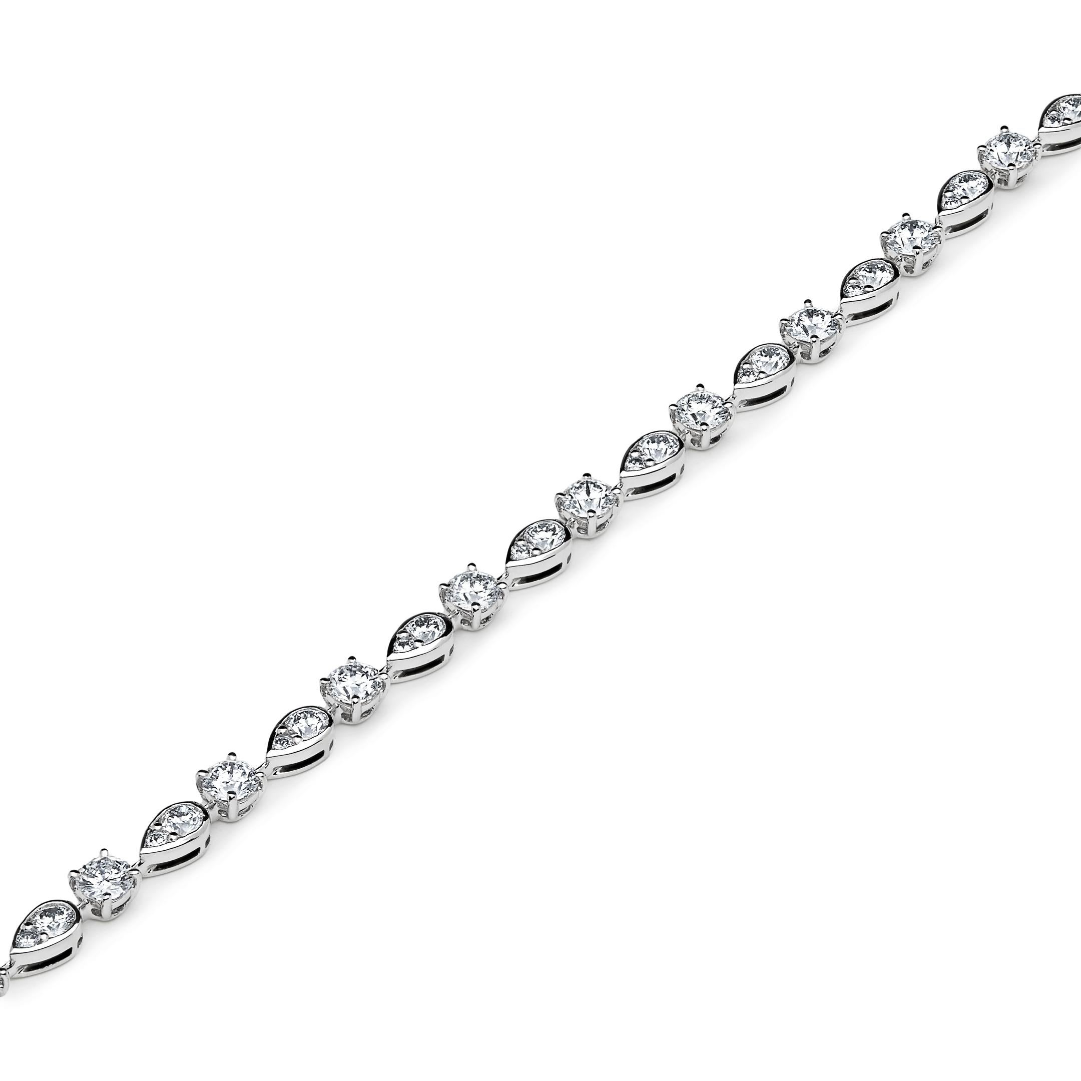 Graff Platinum and White Gold Line Bracelet with White Round Diamonds and Pear Shape Motif

Please contact us for more information. 

*To keep your jewelry in excellent condition, avoid all exposure to moisture, perfume, lotions and