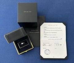 GRAFF, "Promise" GIA 0.50 Carat H/VVS1 Oval Diamond Ring, Baguette side stones