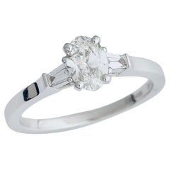 GRAFF, "Promise" GIA 0.50 Carat H/VVS1 Oval Diamond Ring, Baguette side stones