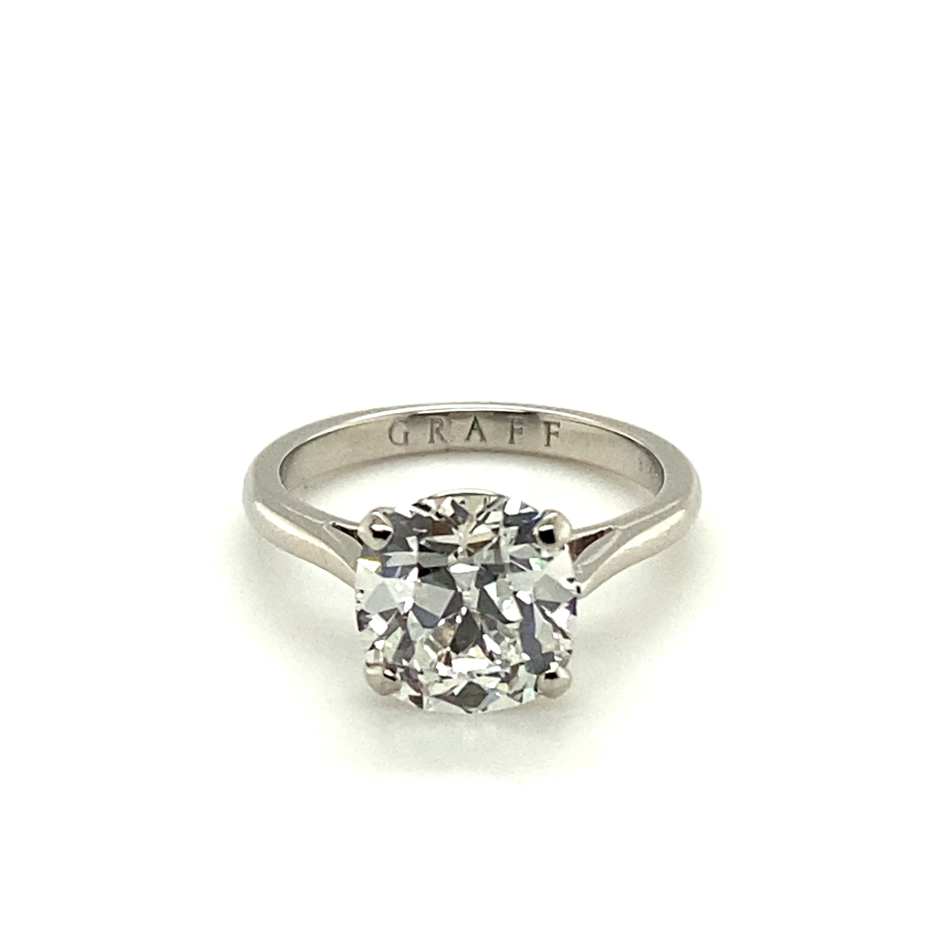 This timeless and stunning solitaire diamond ring by well-known diamantaire GRAFF is set with a beautiful old mine/cushion-cut diamond of 3.14 carats with G colour and vs1 clarity.
Set in a classic four-prong setting in 18 karat white gold, this
