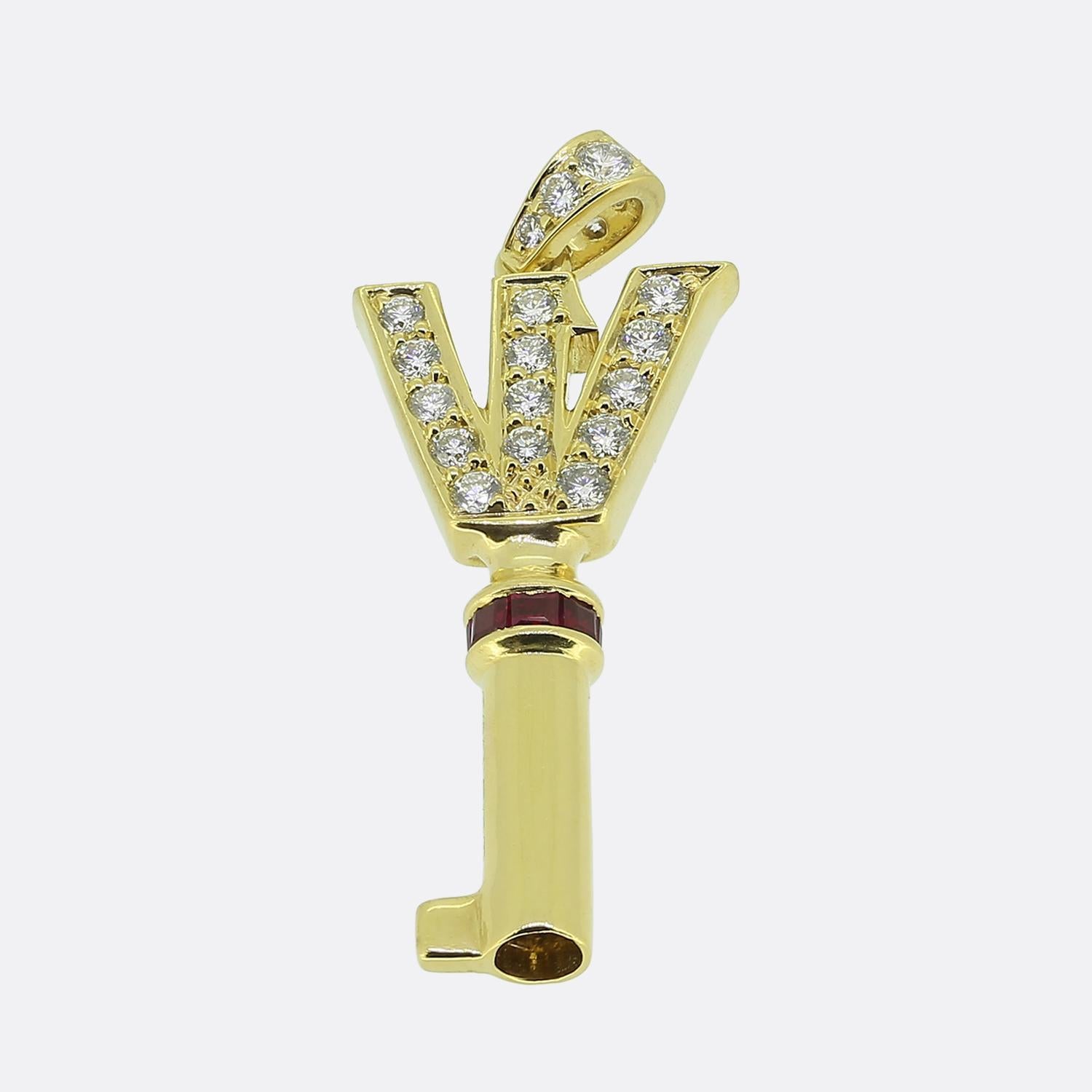 Here we have a striking pendant from the world renowned luxury jewellery house of Graff. This piece has been crafted from a rich 18ct yellow gold into the shape of a key and features a centralised trim consisting of square-cut rich red rubies.