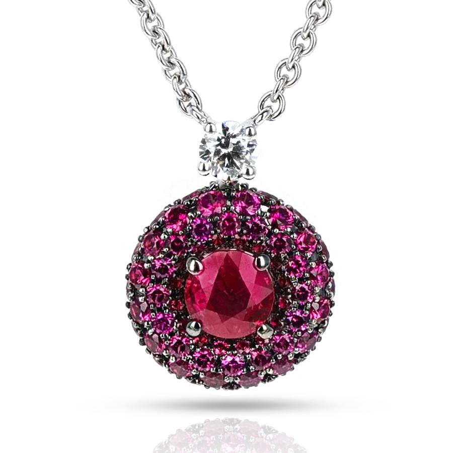 A GRAFF Ruby and Diamond Pendant Necklace made White Gold. The rubies weigh 1.86 carats and the diamond weighs 0.14 carats. The total weight of the pendant necklace is 6.21 grams. The necklace has a Certificate of Quality.