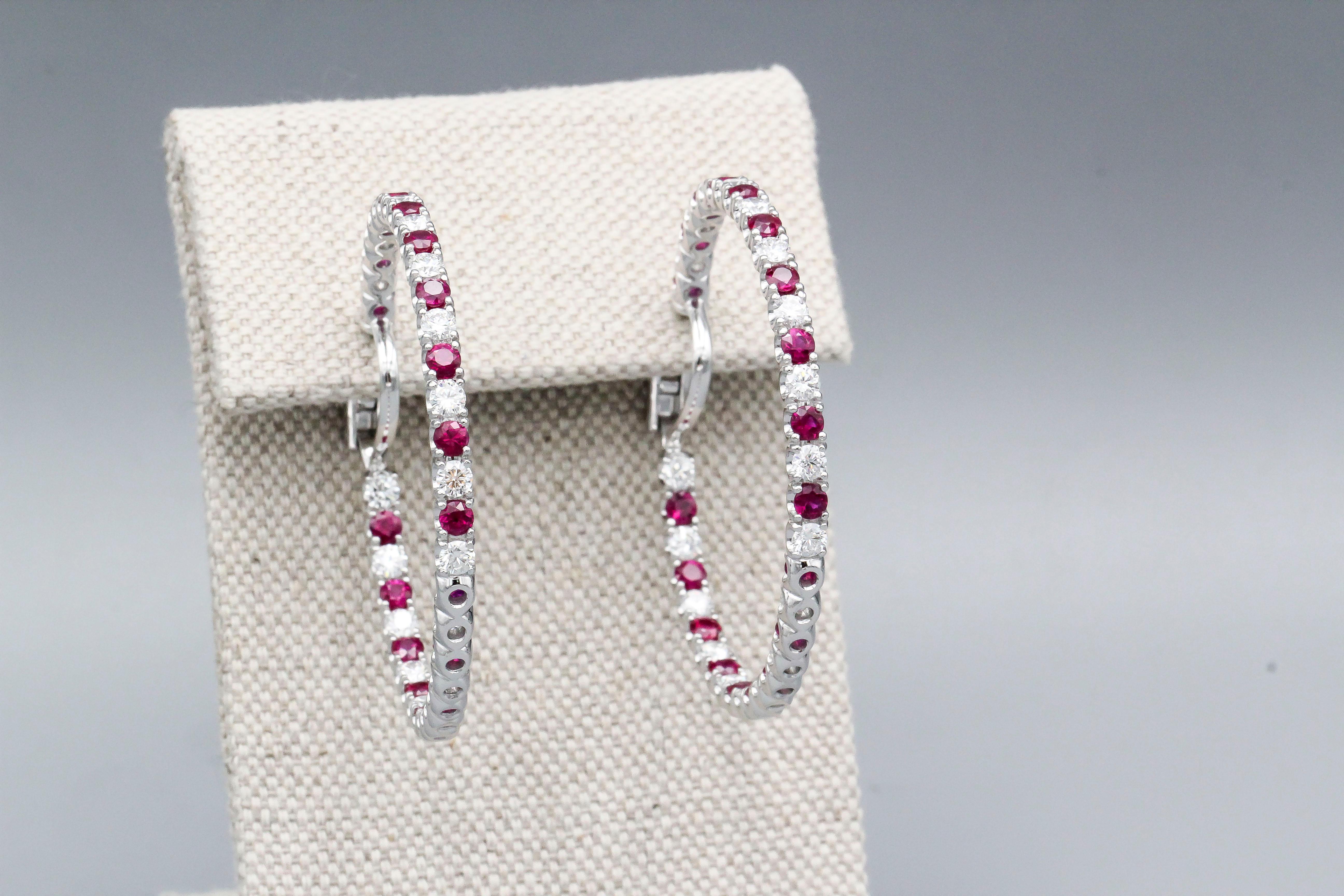 Very fine pair of ruby, diamond set in 18k white gold 