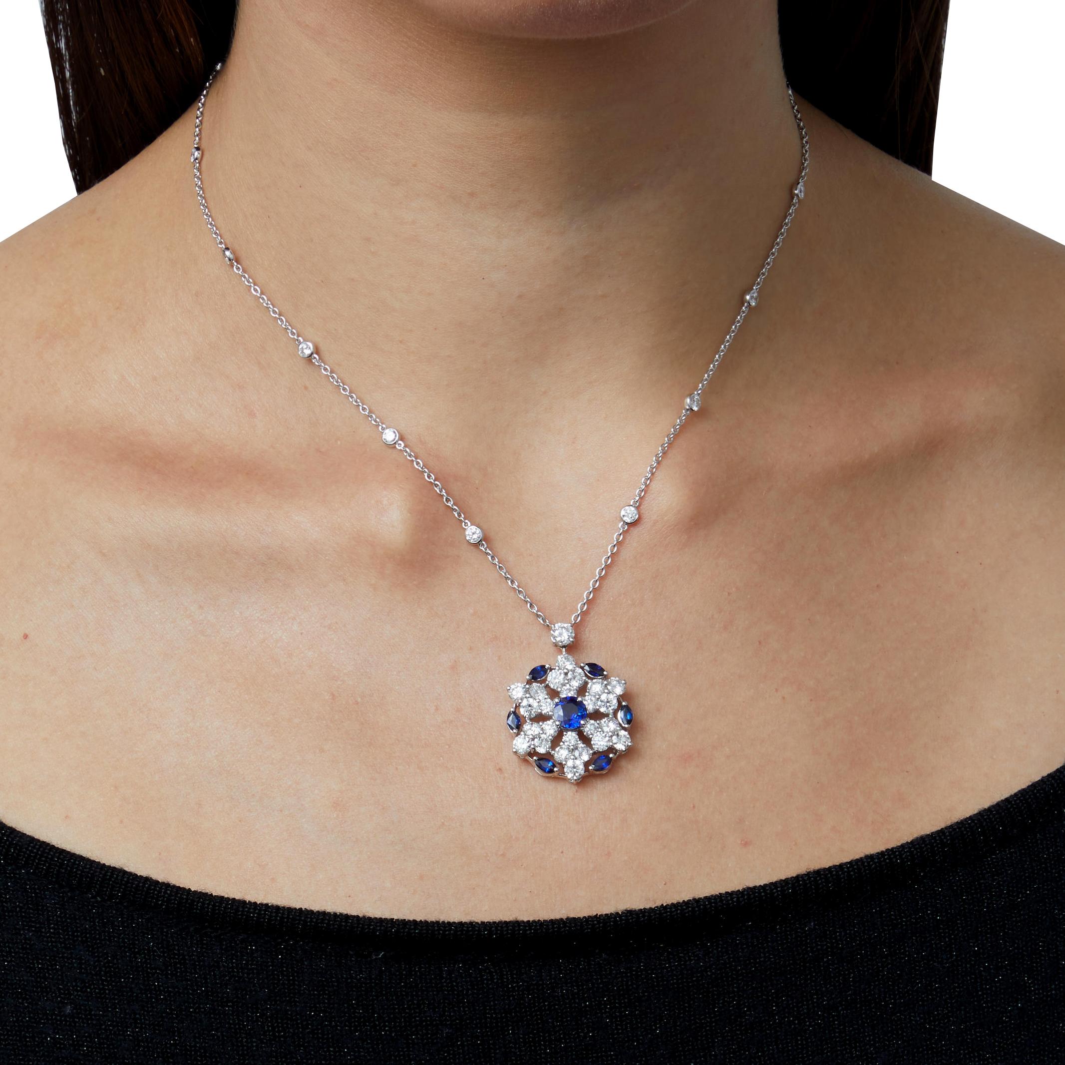 A whimsical pendant necklace by Graff showcasing 5.10ct of the finest round brilliant cut diamonds with 1.80ct of sapphires mounted in 18k white gold. The necklace has a total length of 16