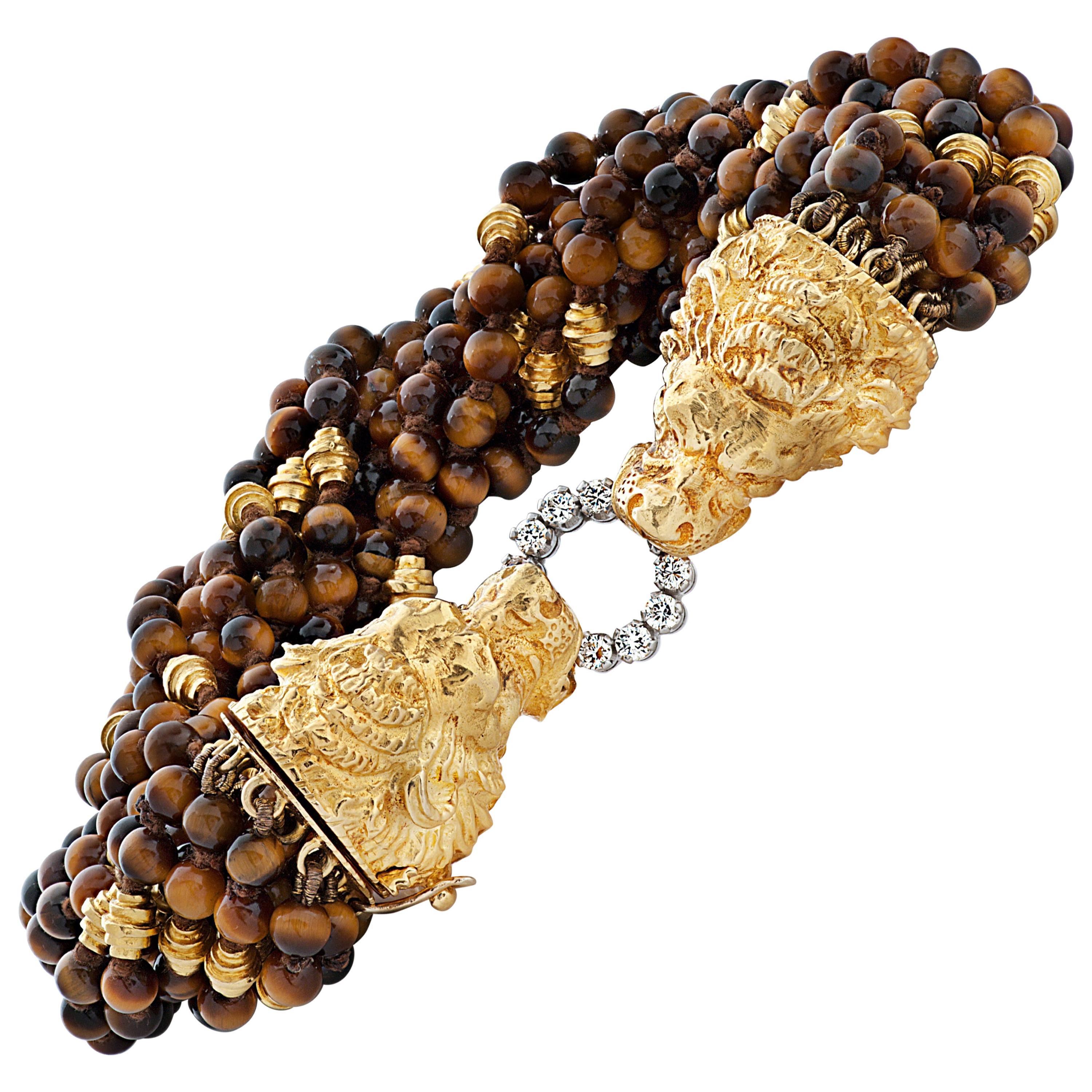 Bracelet vintage Graff œil de tigre en perles et diamants avec fermoir tête de lion 18 carats