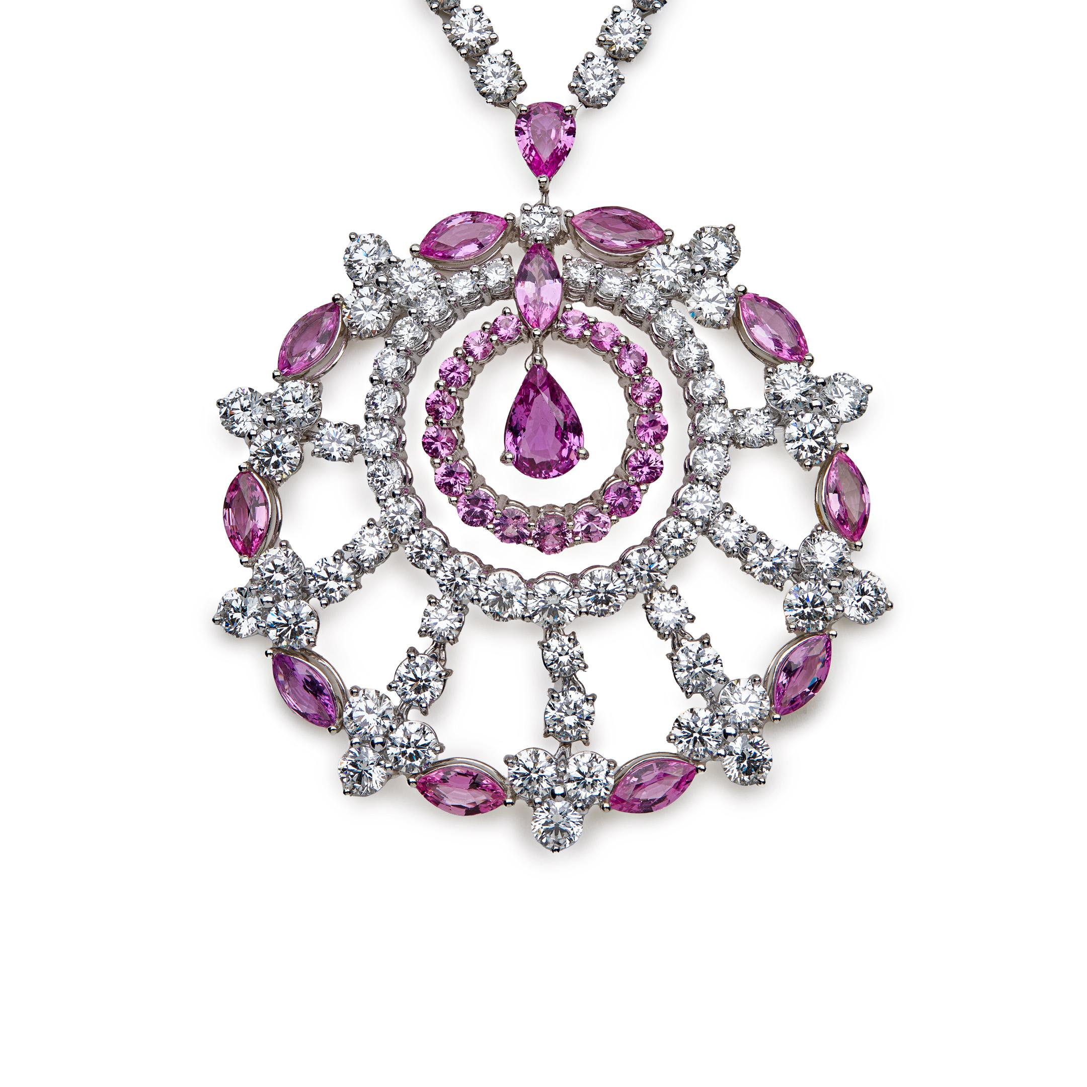 Graff Pink Marquise White Gold Large Snowflake Necklace with White Round Diamonds and Pink Marquise and Pear shape Sapphires.

Please contact us for more information. 

*To keep your jewelry in excellent condition, avoid all exposure to moisture,
