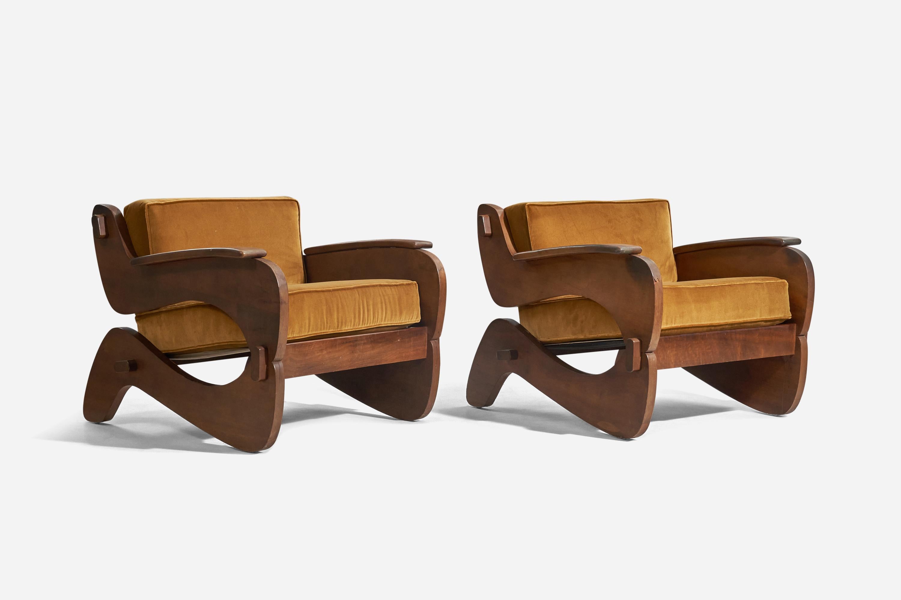A pair of wood and velvet lounge chairs designed and produced by Grafton Everest, South Africa, c. 1970s.