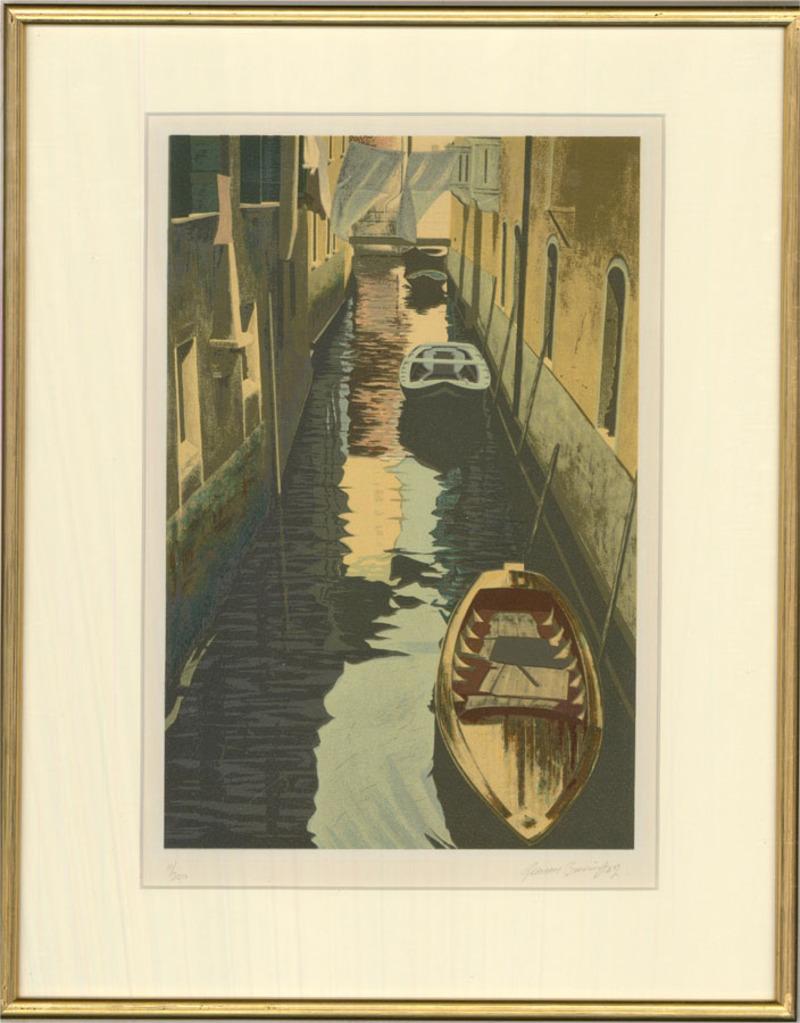 A well executed, crisp silkscreen print showing a back street canal in Venice with boats reflecting in the rippling water. The artist has signed and numbered (11/300) to the lower edge and the print has been presented in a simple gilt frame with