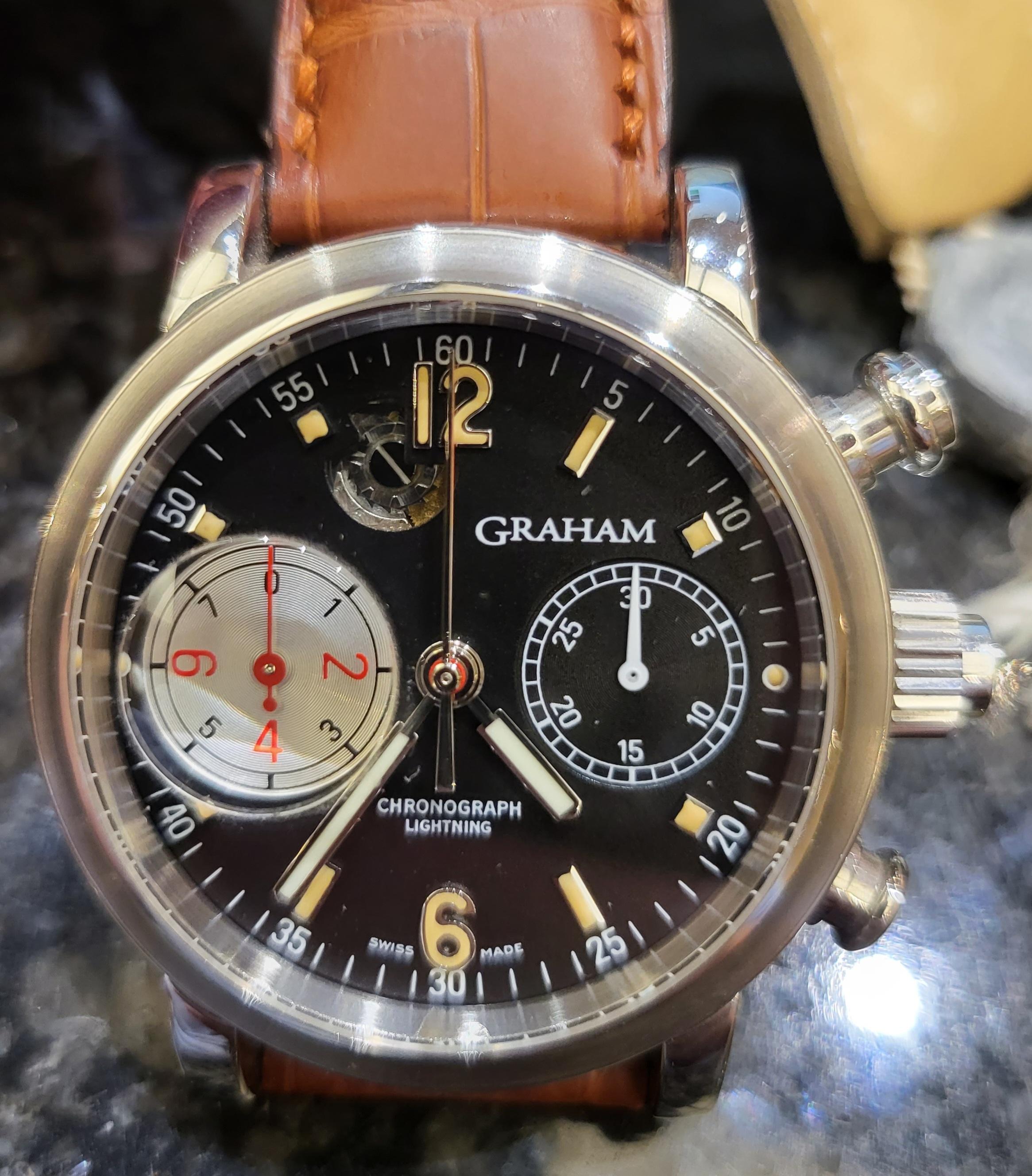 Graham Chronograph Foudroyante/Rattrapante Lightning New in Box With all Warranty Papers

Movement: Self-winding G-1695 chronograph movement, power reserve of 42 hours, watch has passed the G.O.S.C. official chronometer test. 40 rubies 28800 uph two