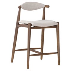 Sgabello da banco in finitura noce con rivestimento beige - Collezione Grain