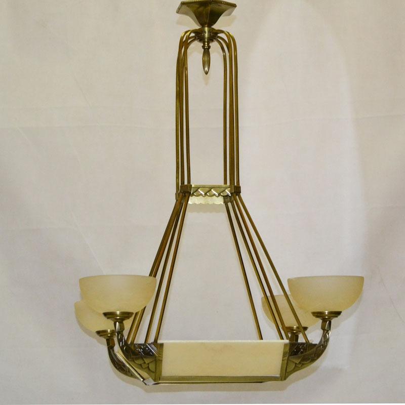 Large four-armed Art Deco lamp with alabaster plates and lampshades, eight lights. The electrification is brand new and the alabaster pieces are in wonderful condition with a very beautiful patina almost looks like new, has no dents or breaks, has